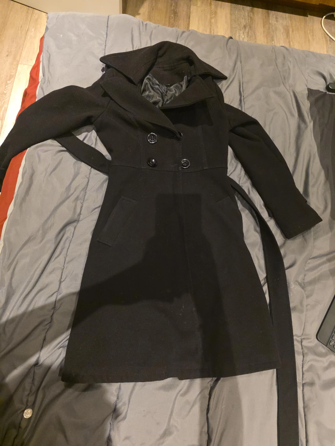 Black belted wool coat