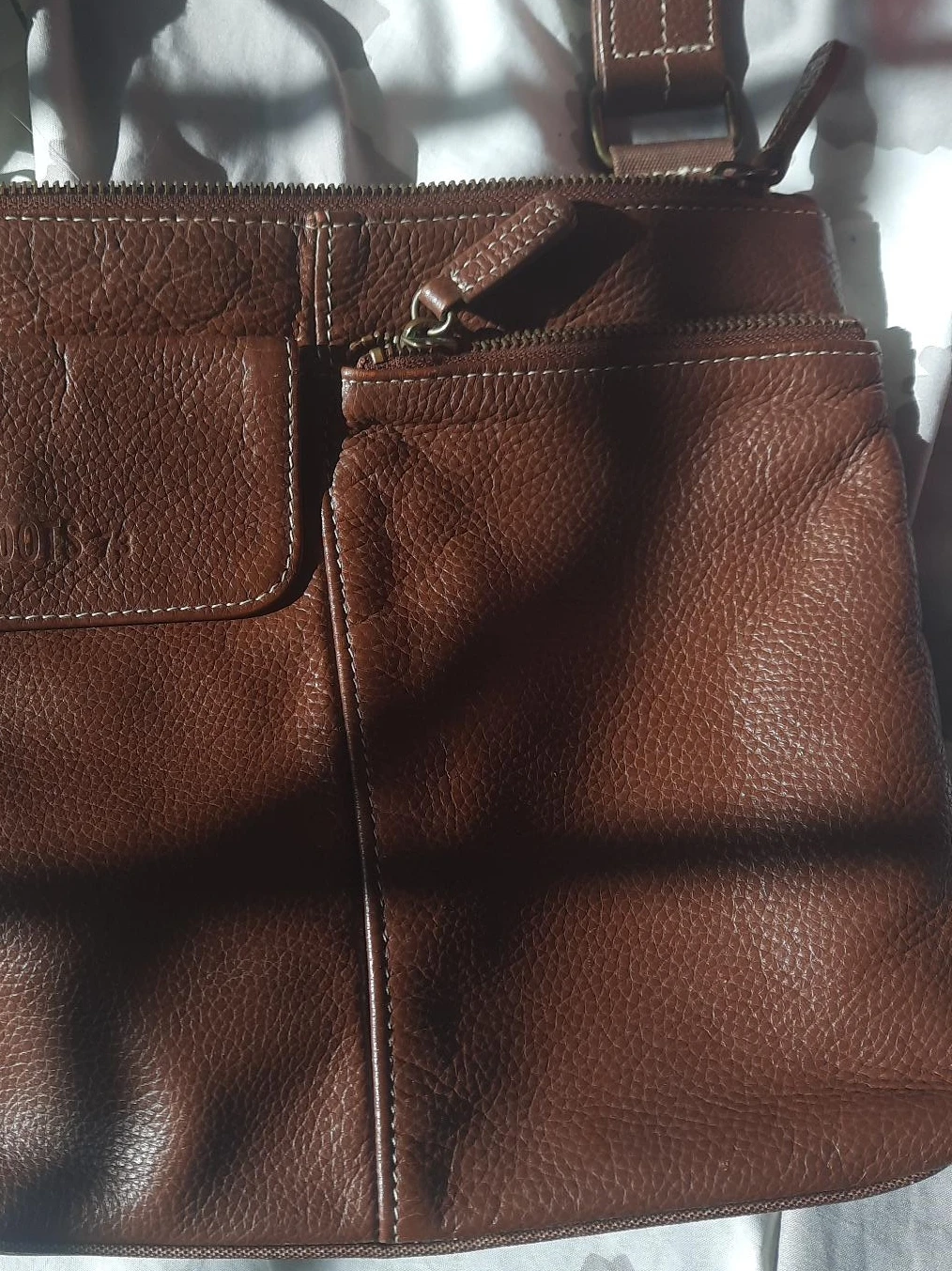 Roots Brown Leather Crossbody Bag image indicator(1)