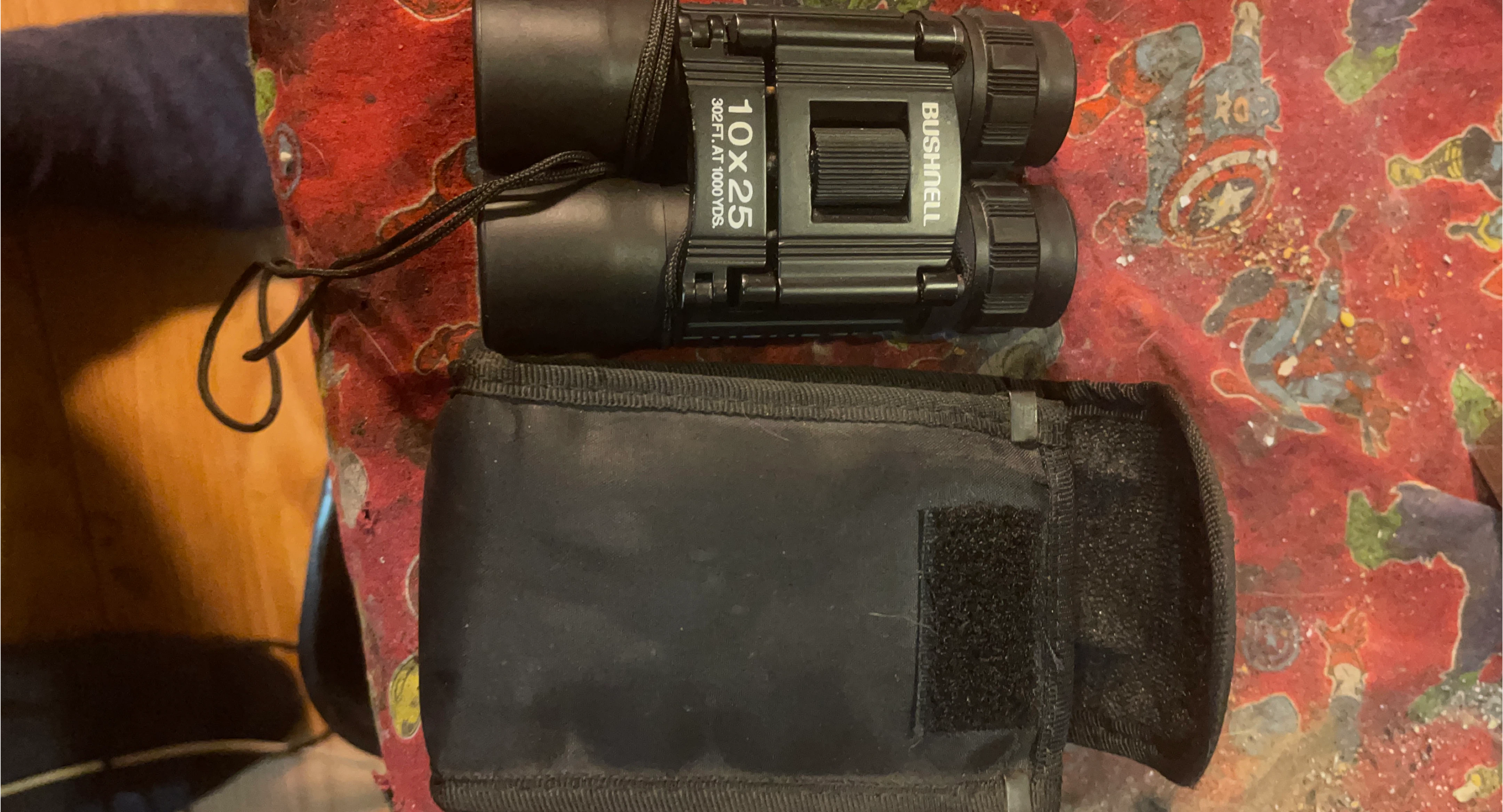 Bushnell 10x25 Binoculars with Case image indicator(1)