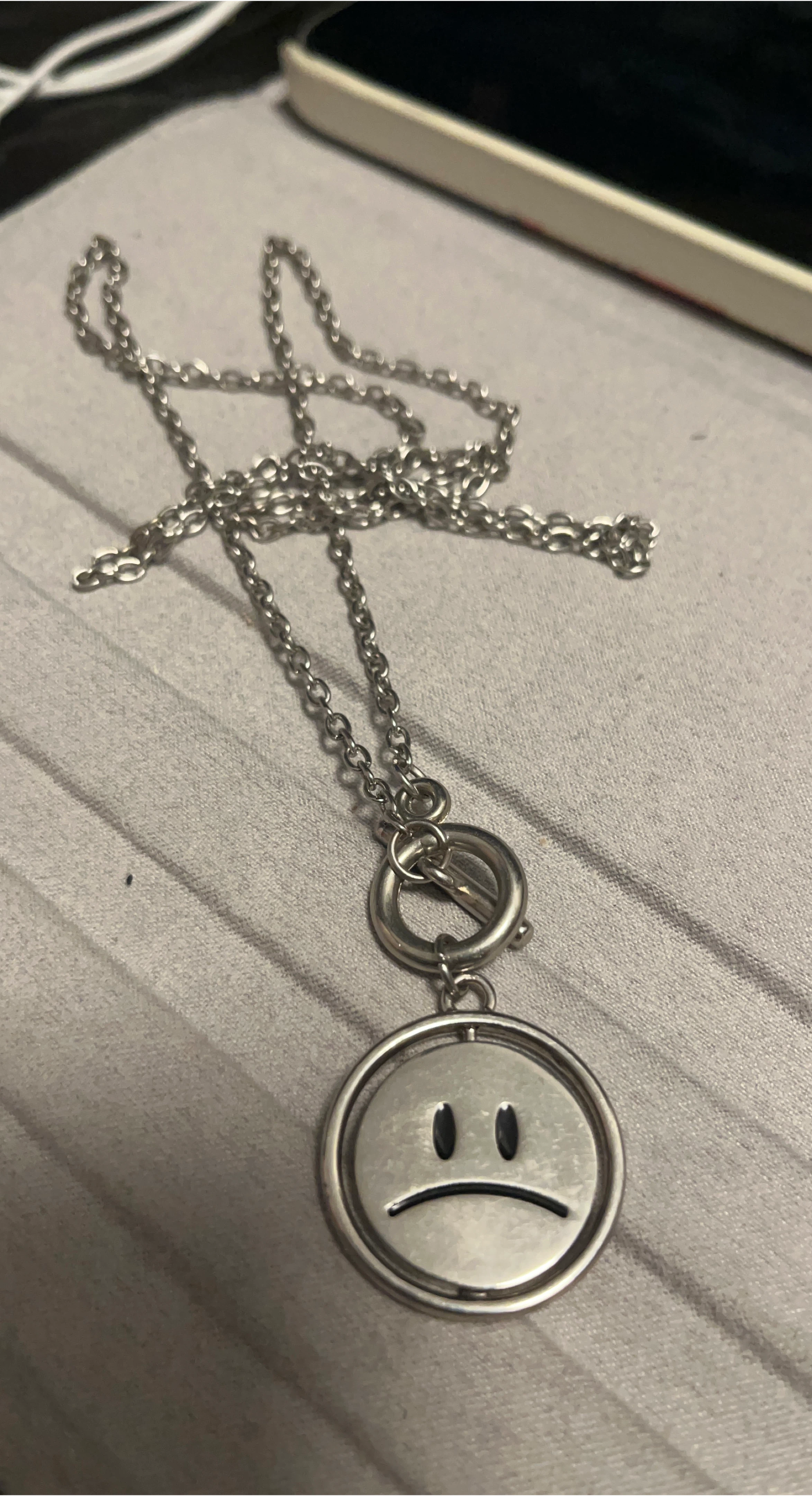 Silver Tone Reversible Smiley/Sad Face Necklace
