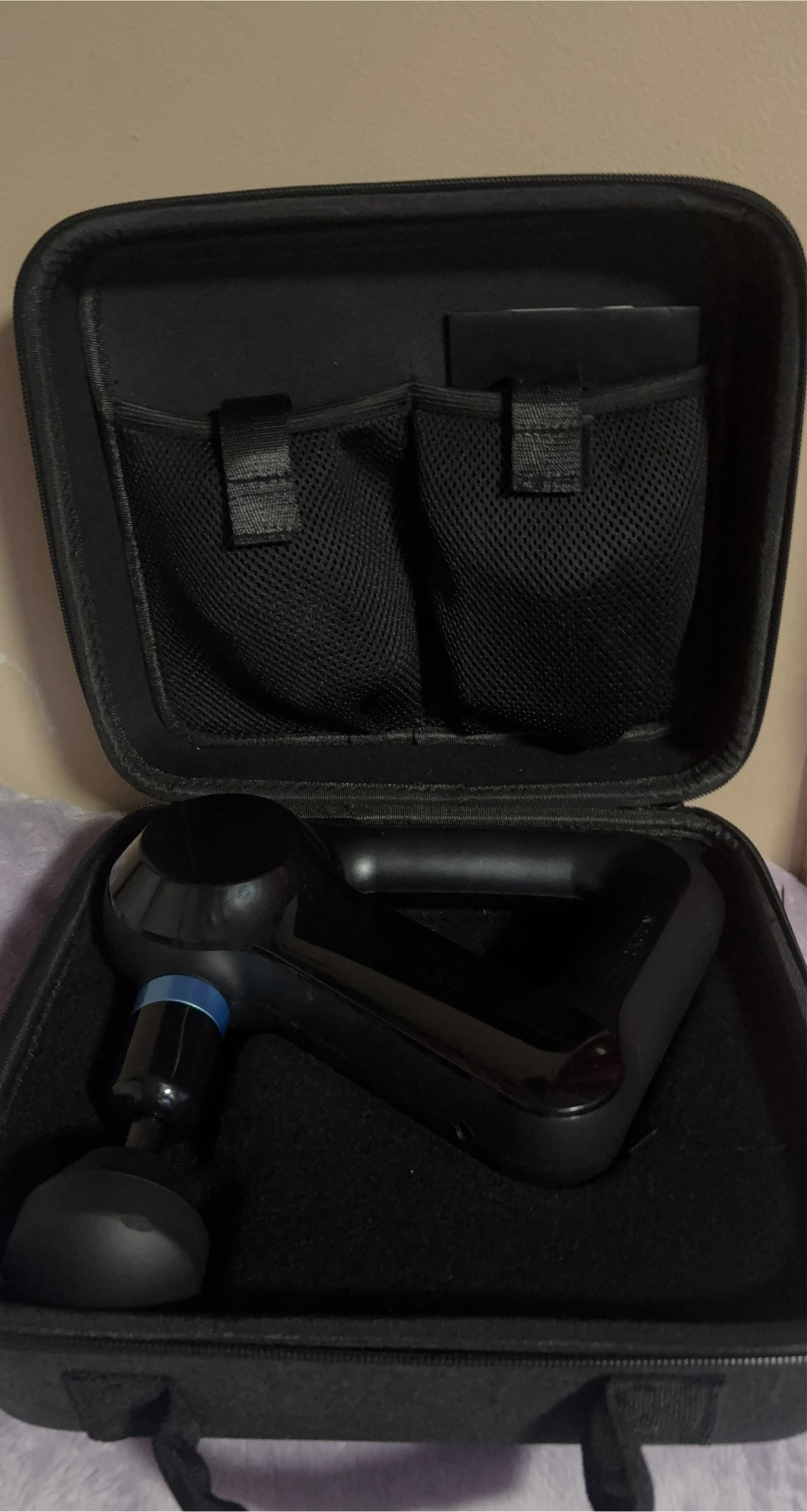 Theragun massage gun with case