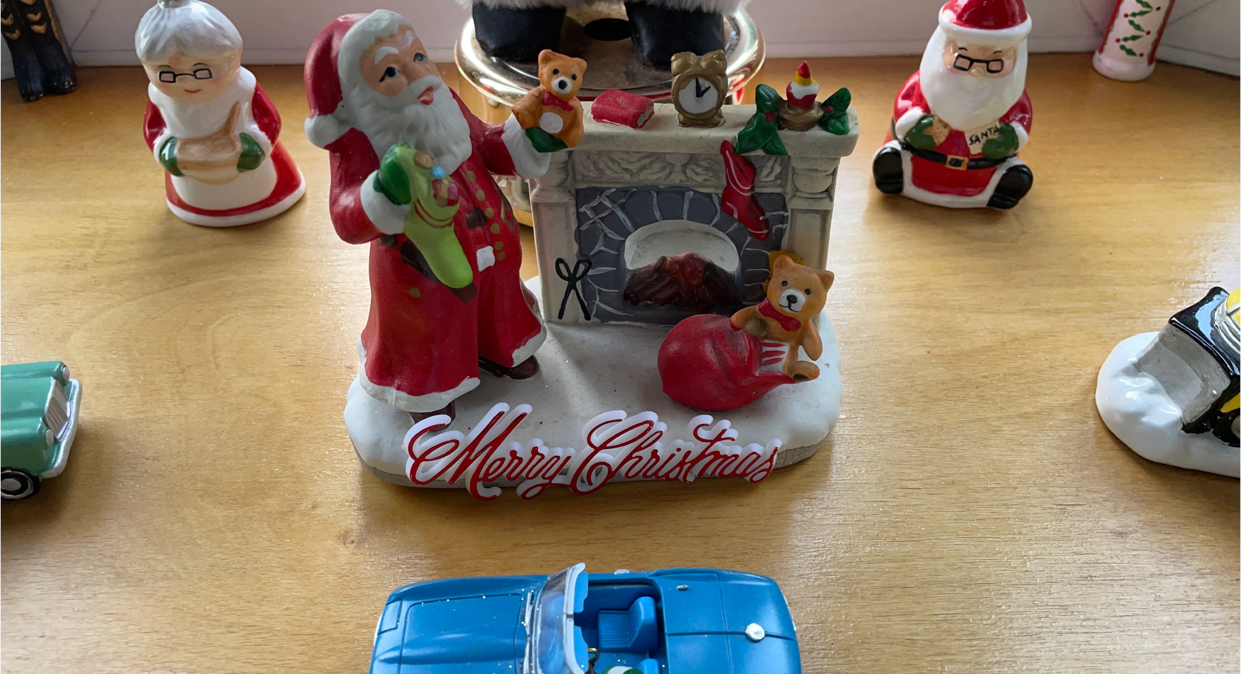 Merry Christmas Santa Fireplace Figurine