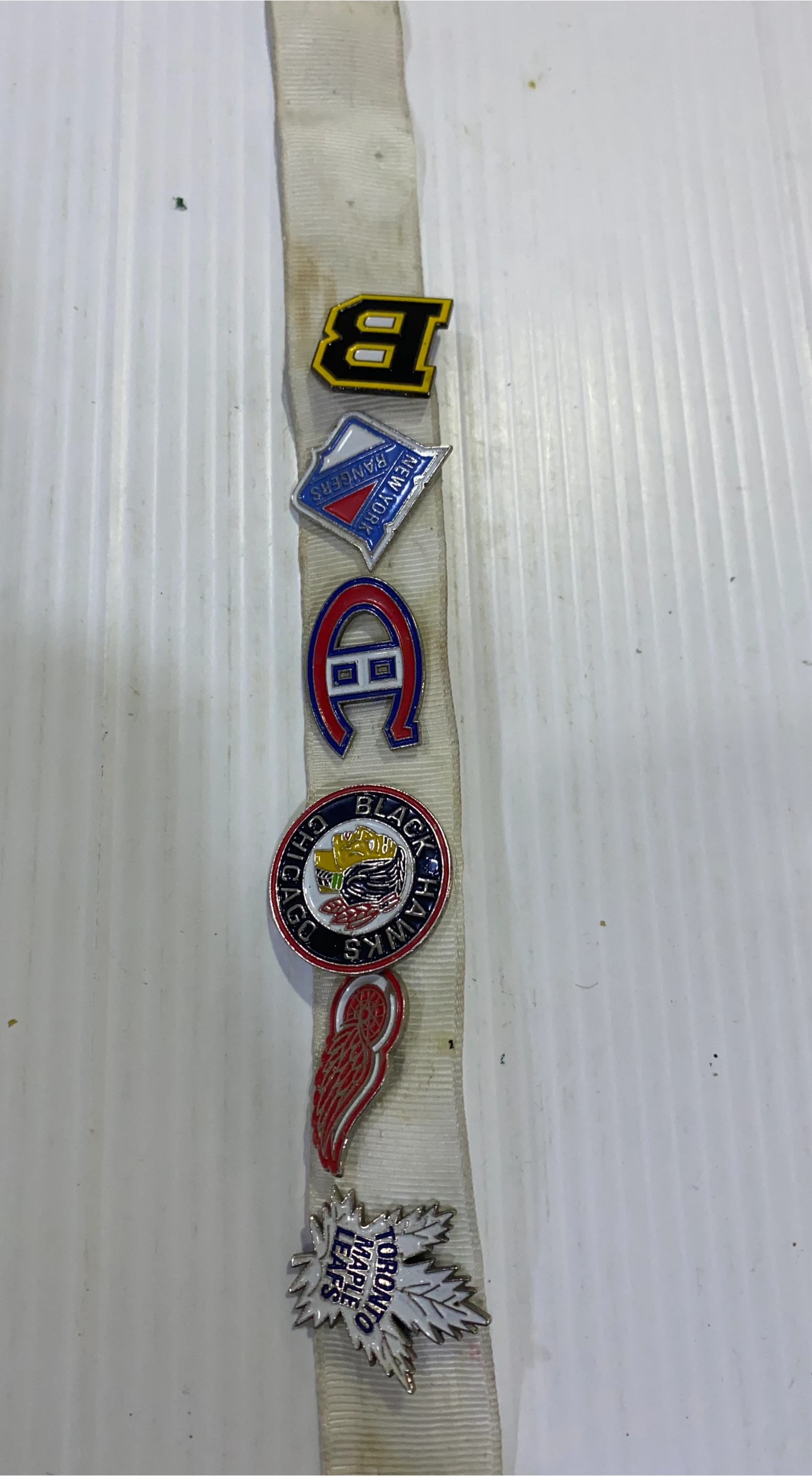 Vintage Hockey Team Pins on Ribbon