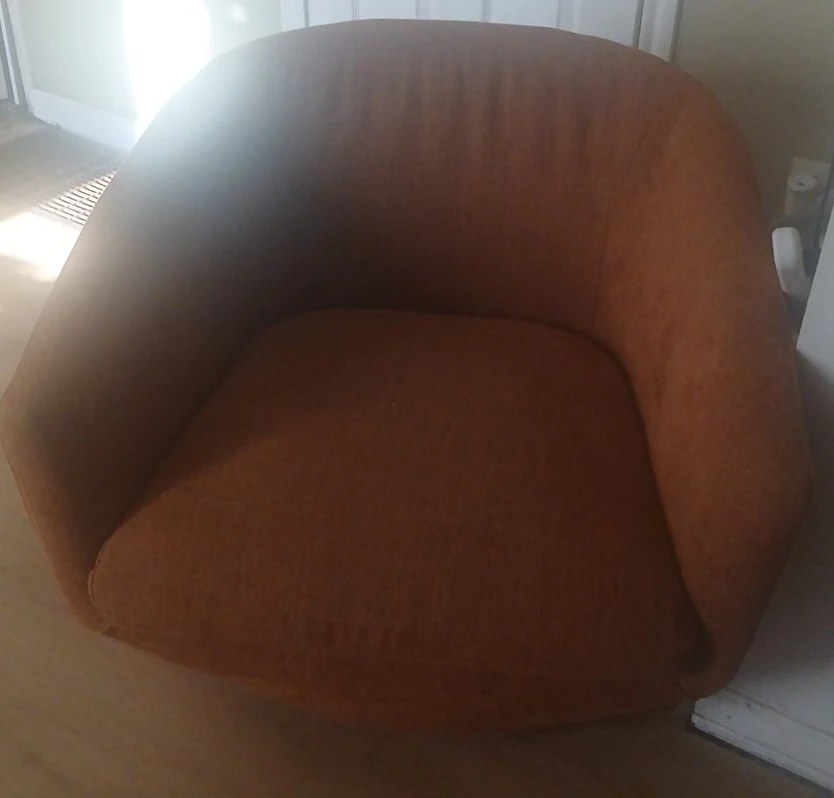 Orange Upholstered Swivel Chair