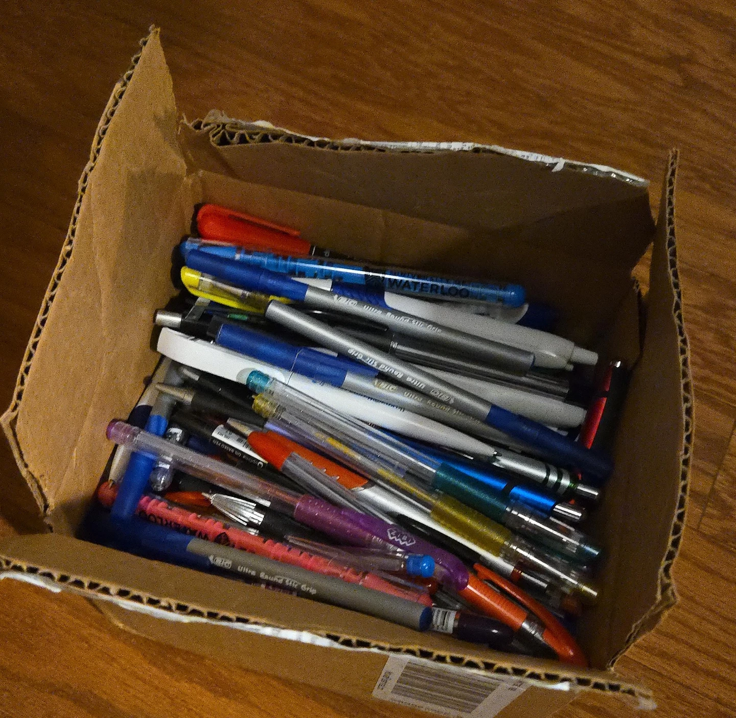 Box of Assorted Pens, Pencils, and markers