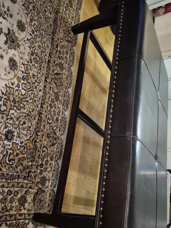 Brown Ottoman with Nailhead Trim