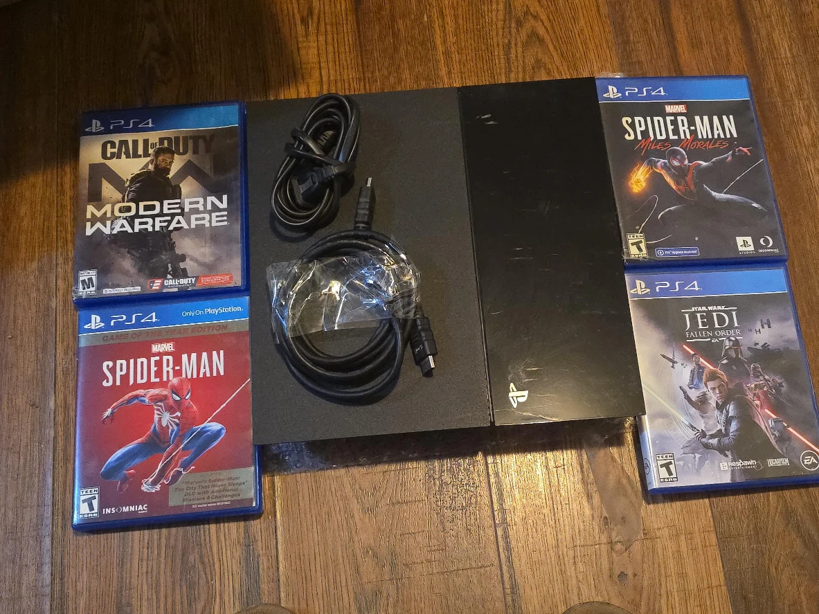 PlayStation 4 w/ Games