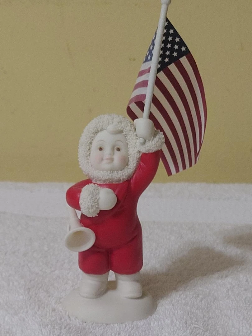 Santa Holding US Flag Figurine