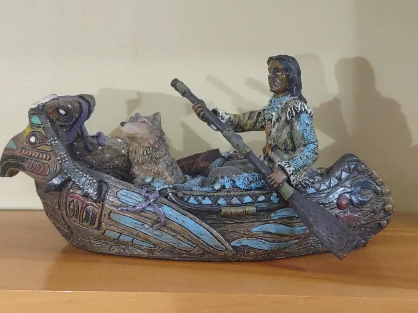 Native American Canoe Sculpture with Wolf