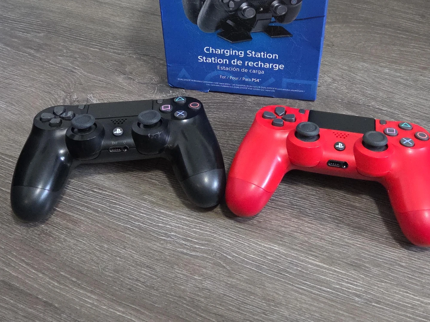 PS4 Dualshock Controllers (black & red) & Charging Station