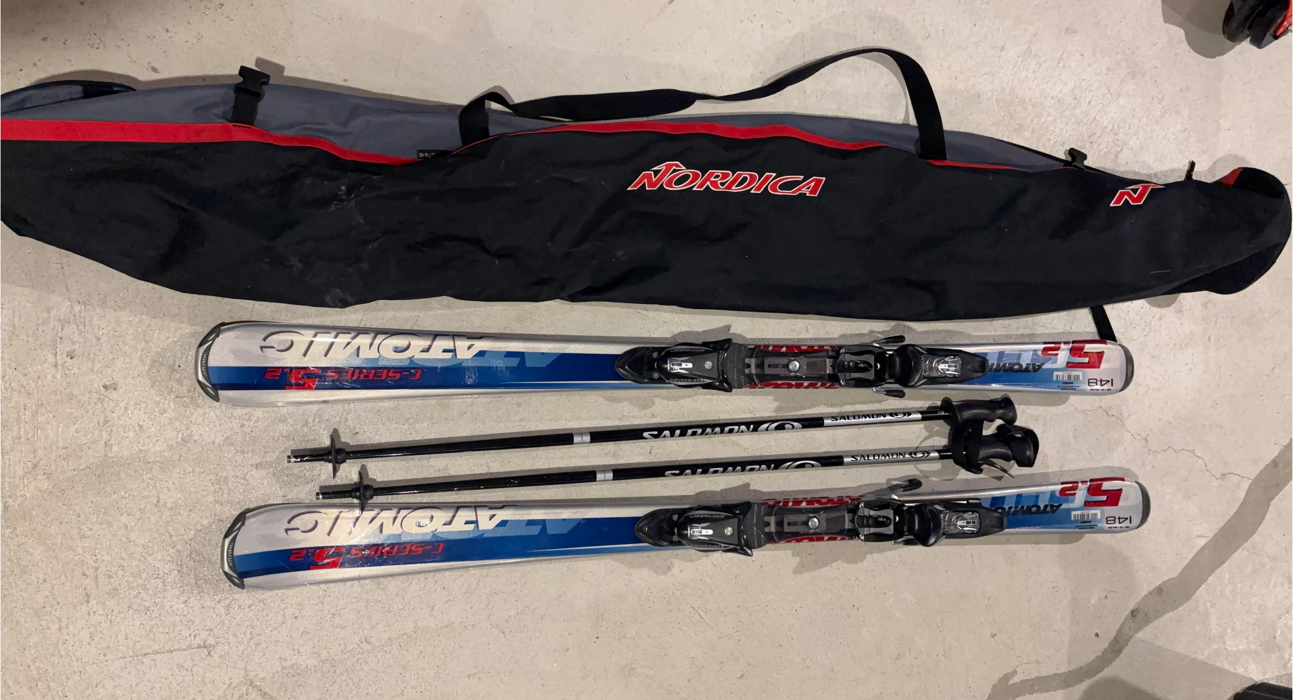 Atomic C-Series 5.5 Skis 148cm with Salomon Poles & Nordica Bag