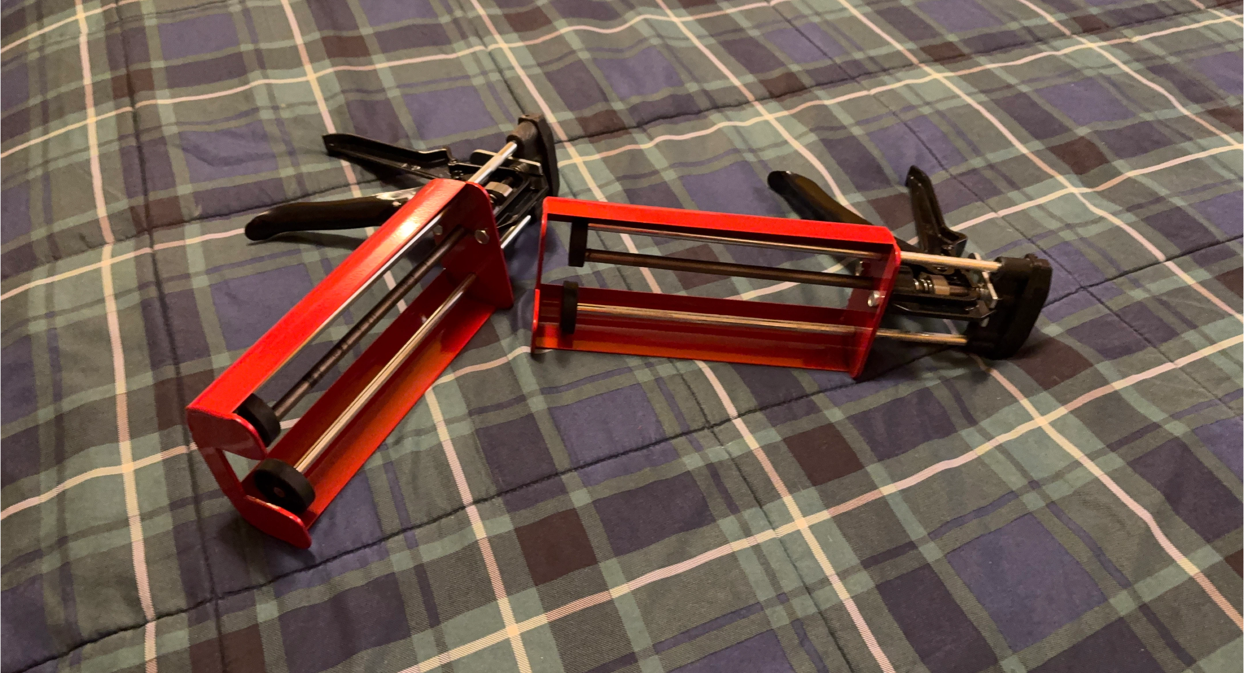 Two Red epoxy Guns