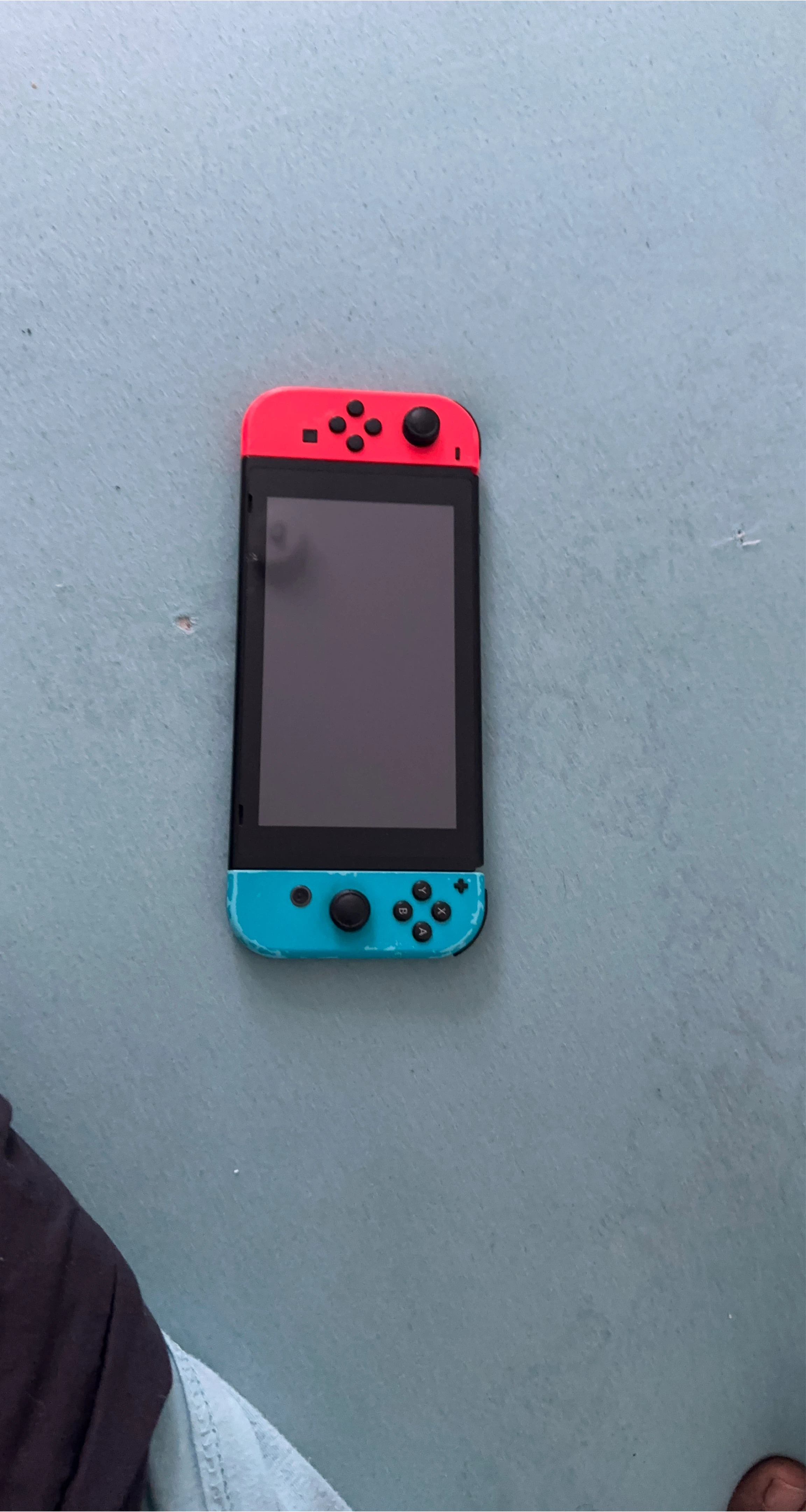 Nintendo Switch with Neon Blue and Red Joy-Cons