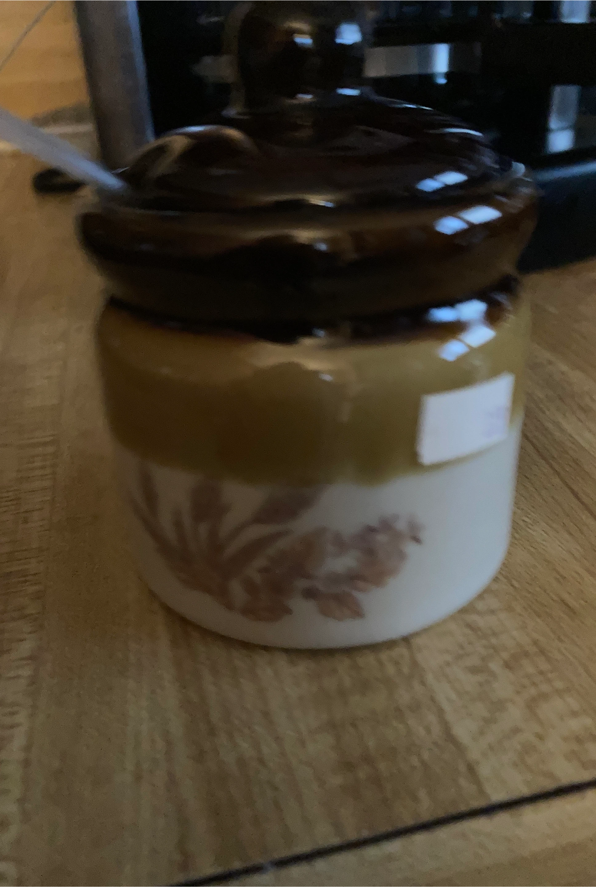 Ceramic jar  with a spoon