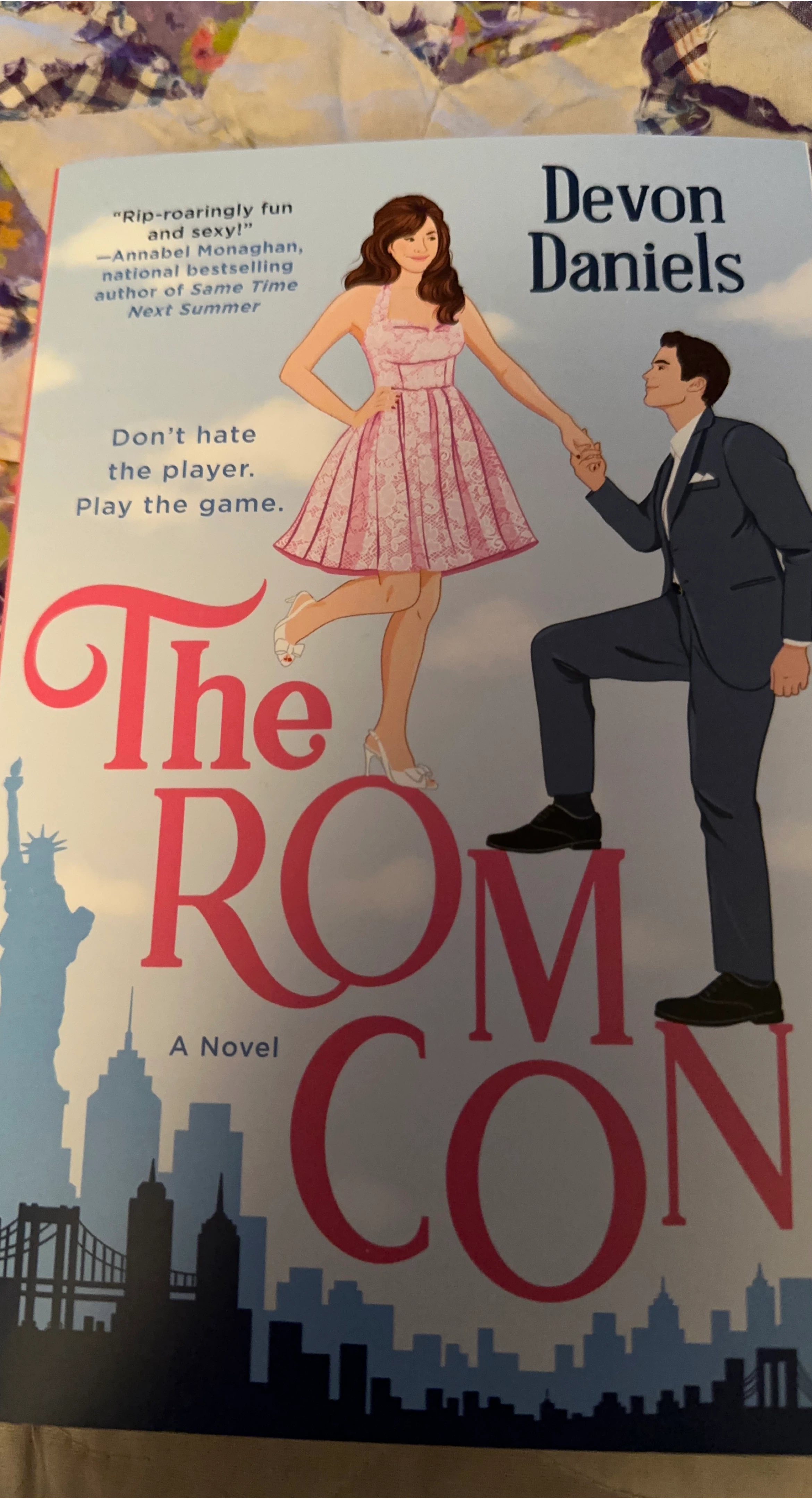 The Rom Com: A Novel by Devon Daniels