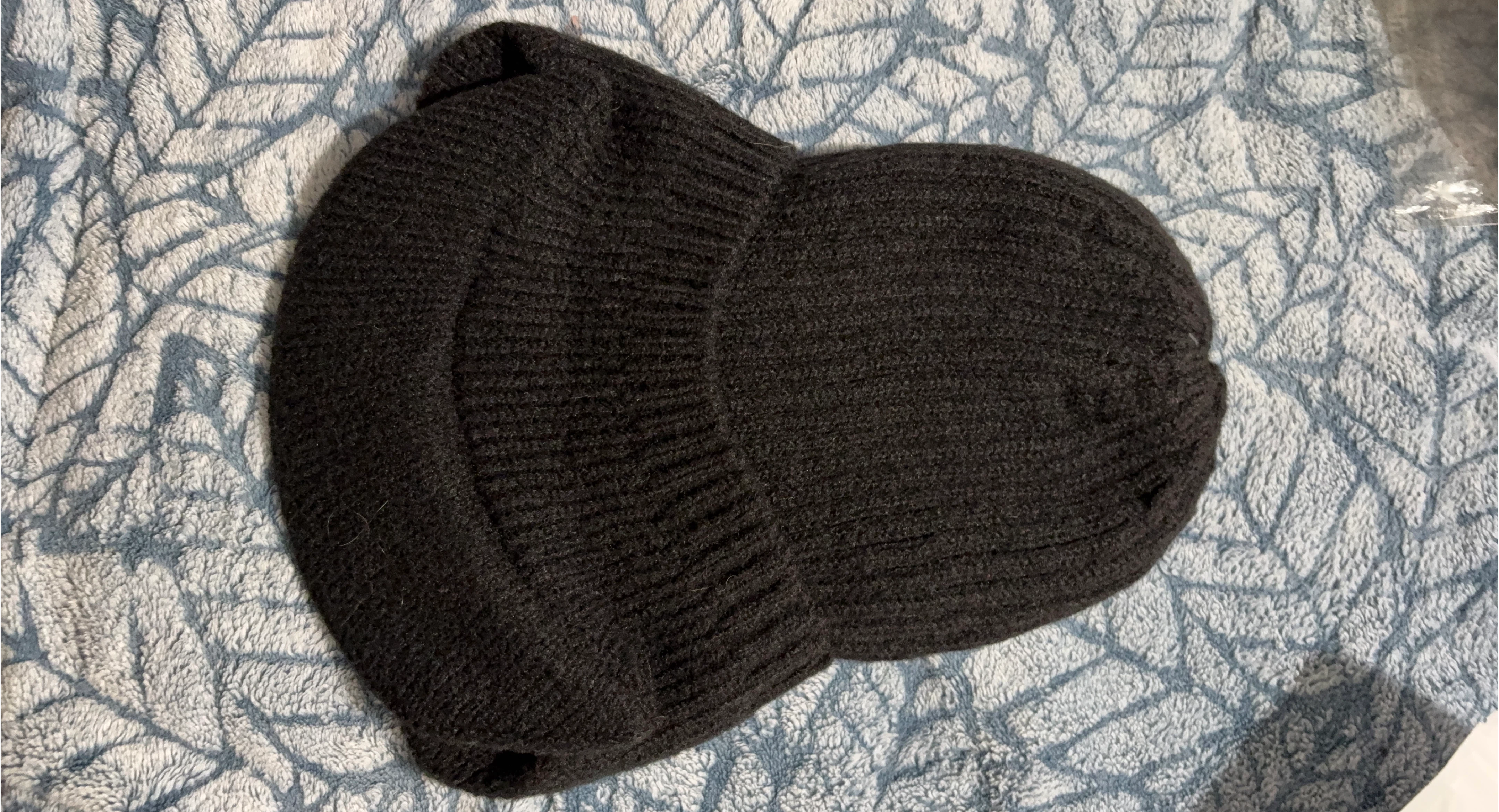 Black knitted visor hat
