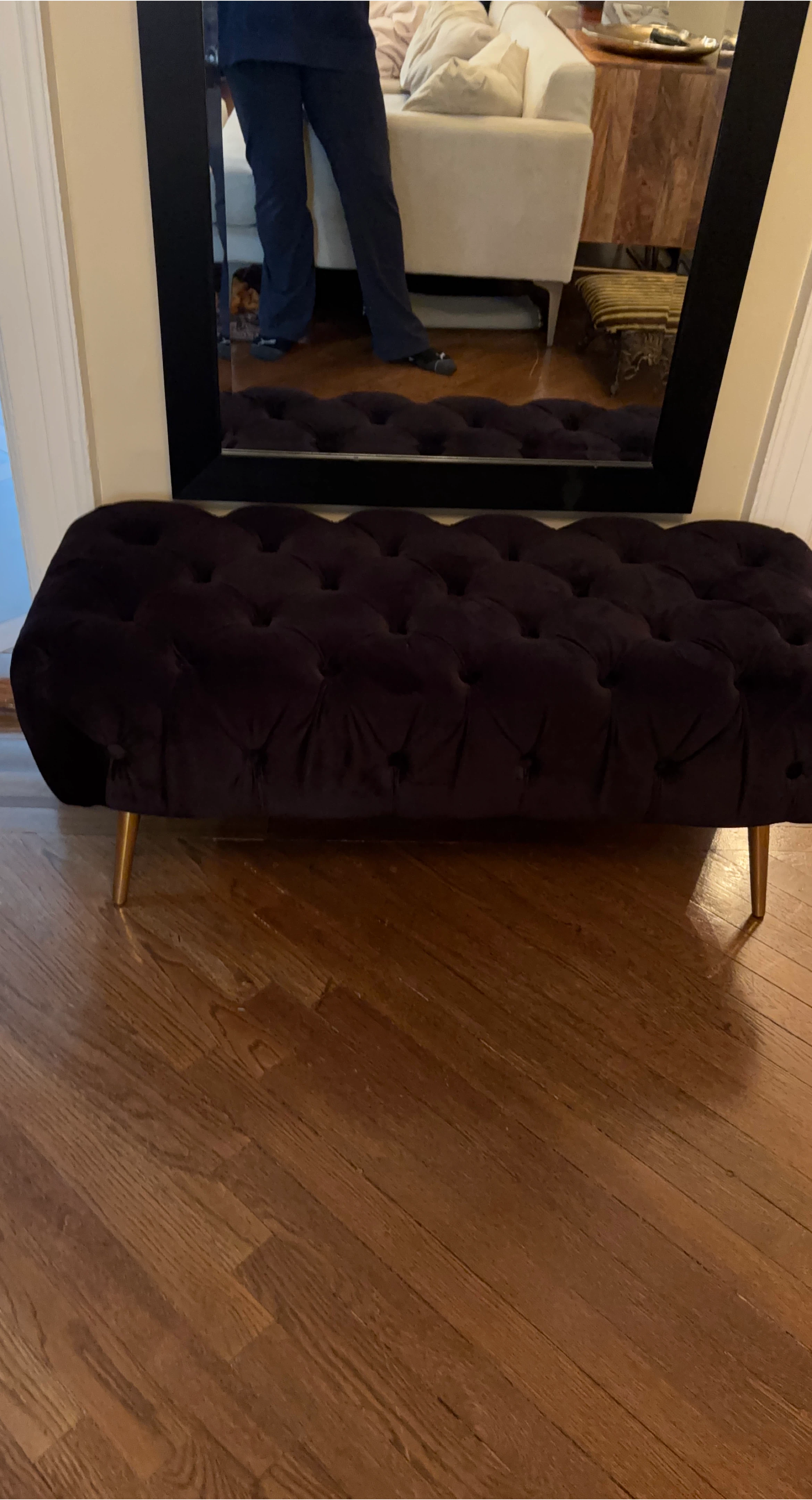 Black tufted velvet ottoman