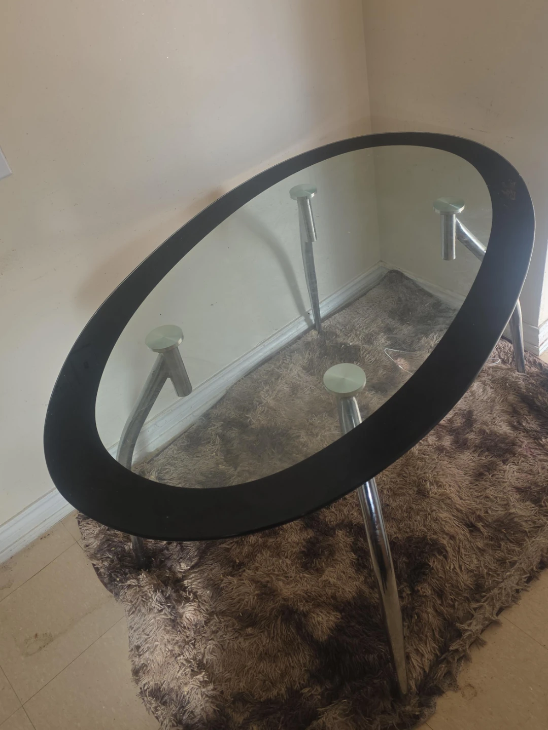 MOVING SALE-Oval Glass Coffee Table with Black Trim