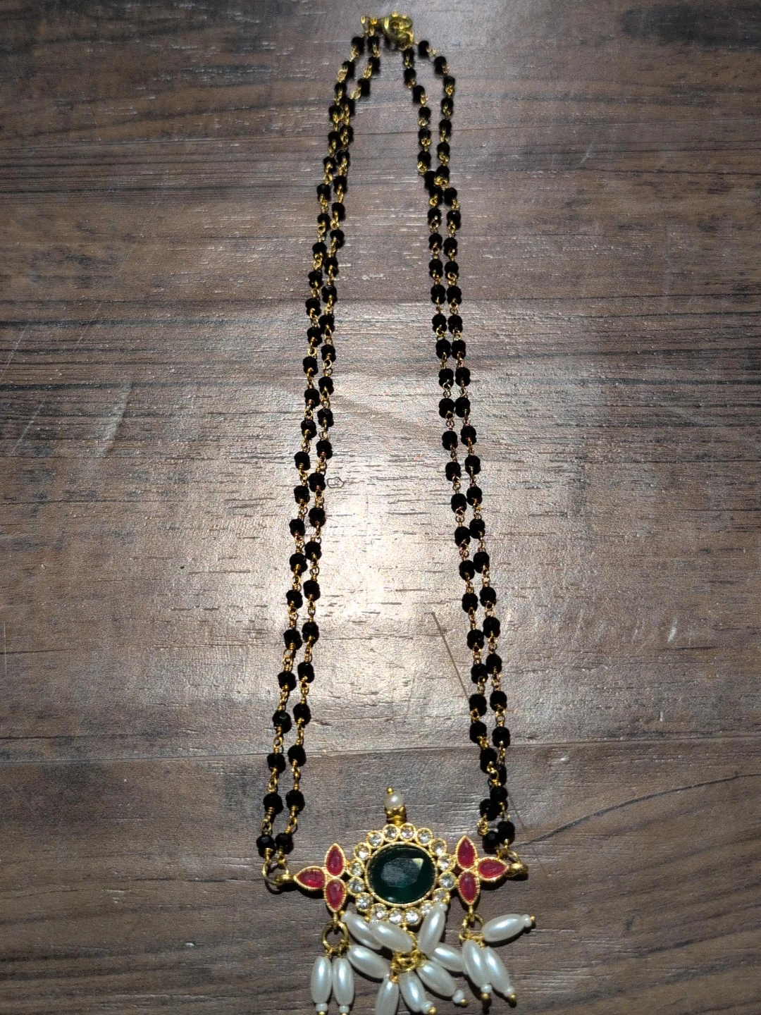Gold-tone Necklace with Black Beads and Green Pendant