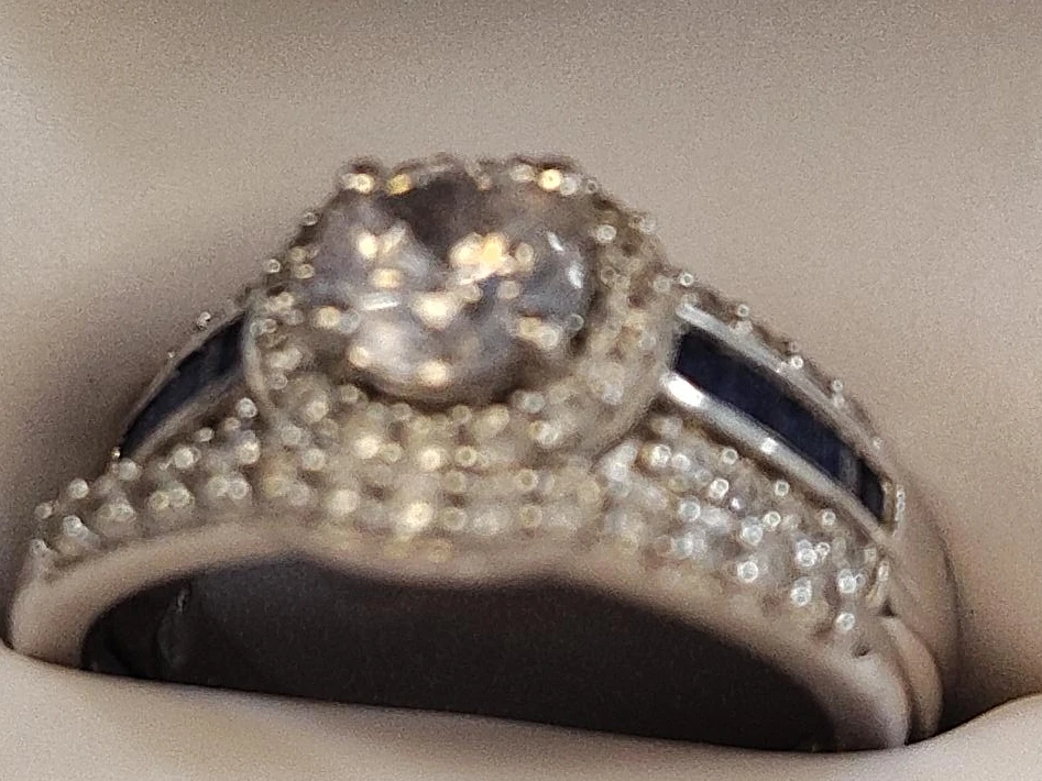 Diamond ring with blue sapphire