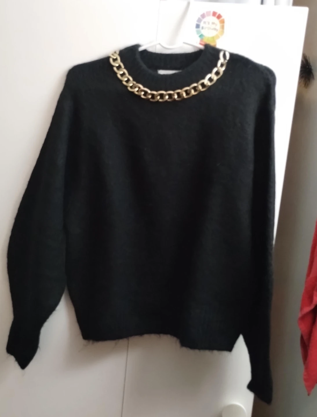 Black Sweater with Gold Chain Detail