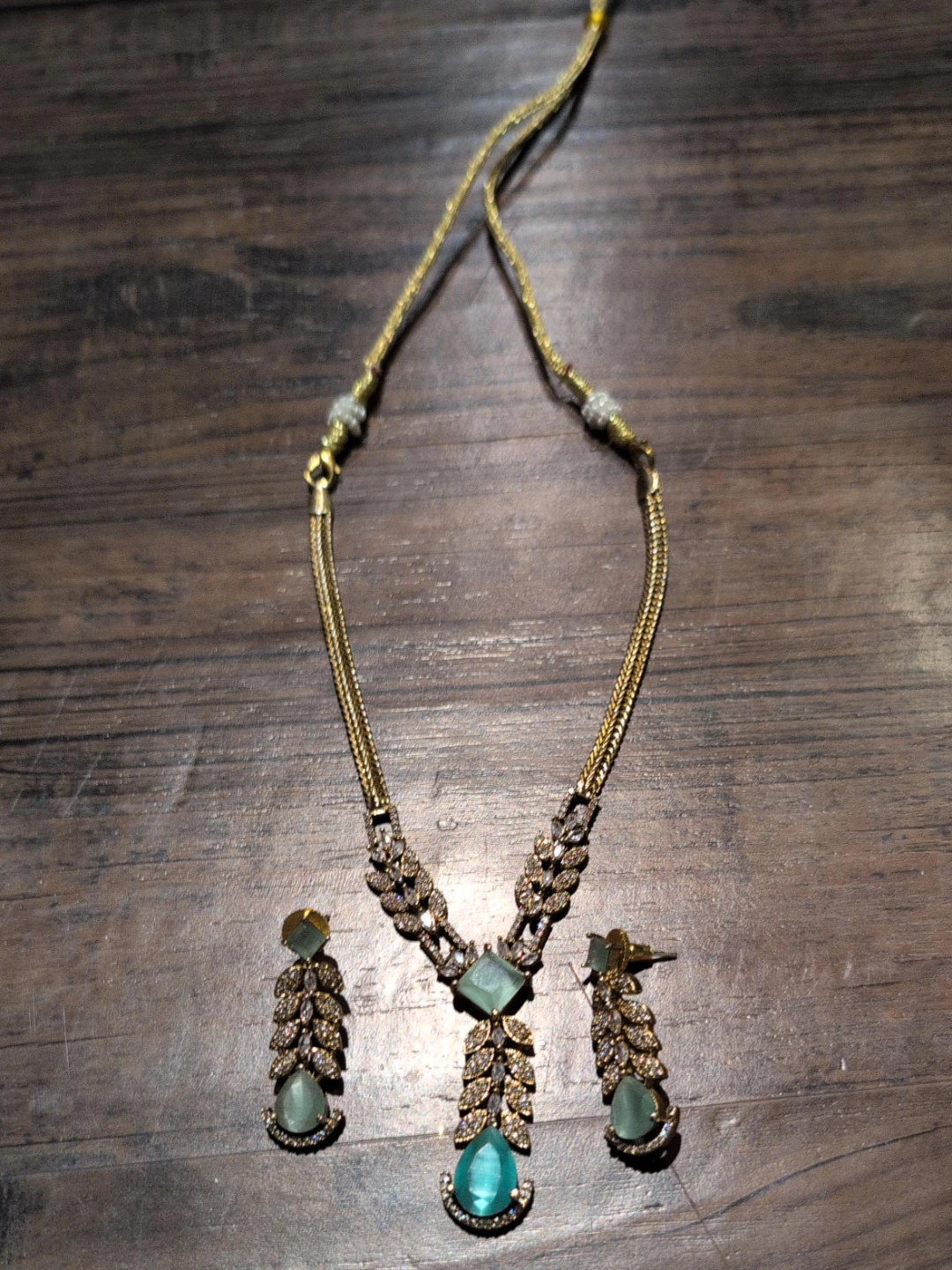 Gold Tone Necklace and Earring Set with Green Gems