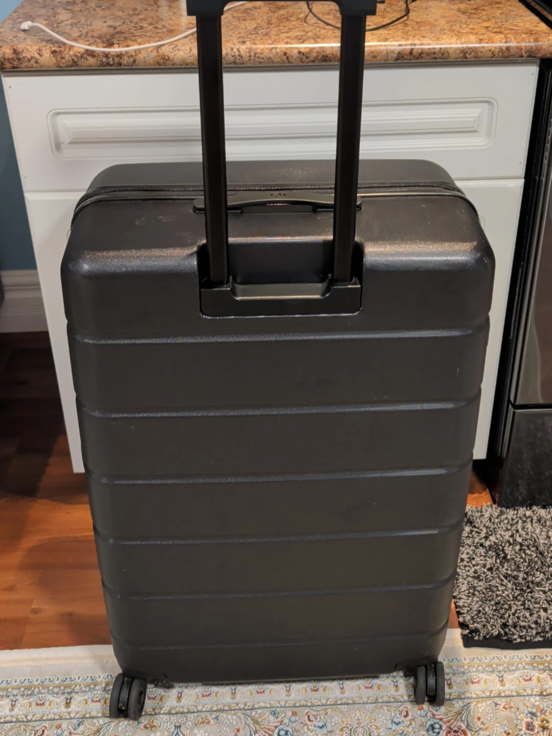 Black Hardshell Rolling Suitcase