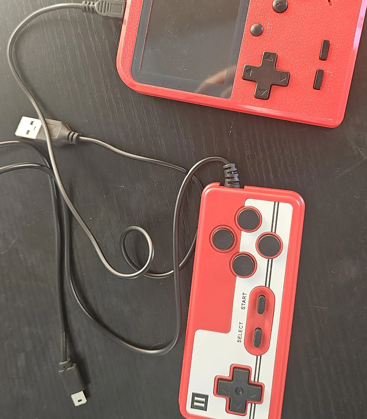 Red Handheld Game Console with Controller