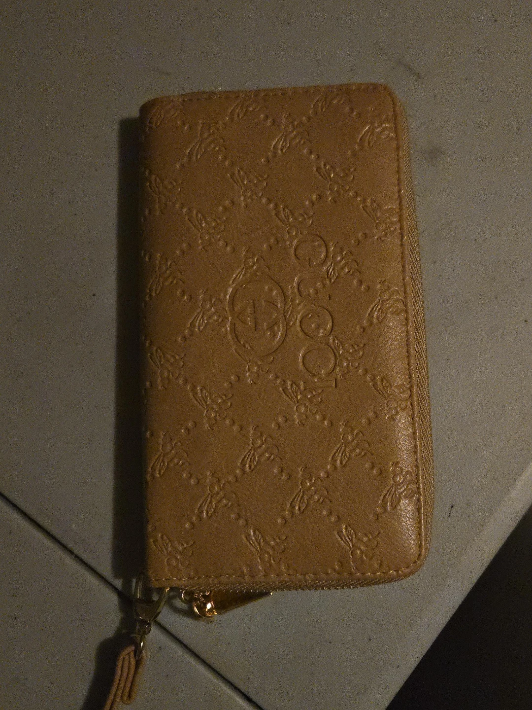 Tan Embossed Zip-Around Wallet
