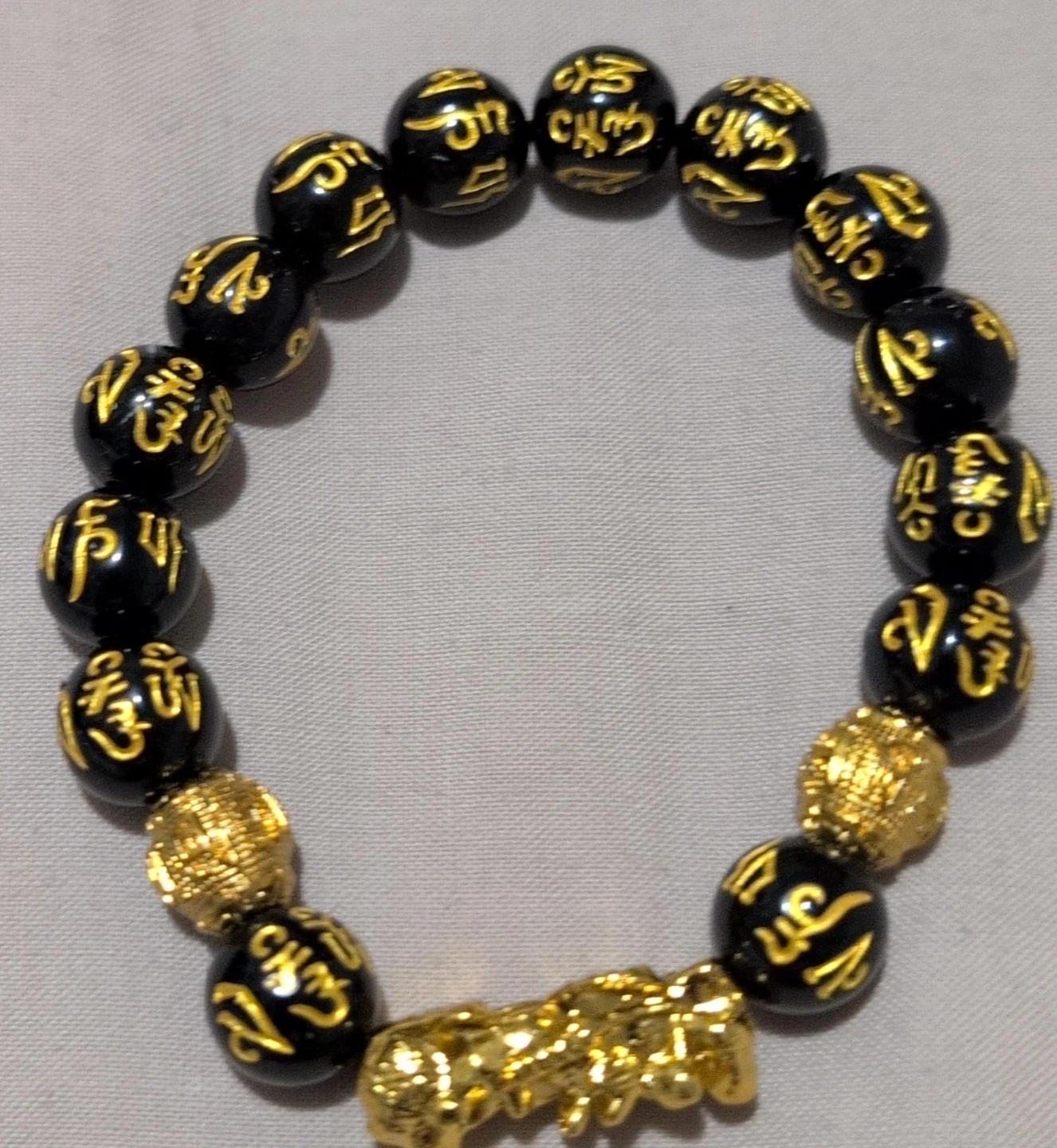 Black and Gold Beaded Bracelet with Symbols