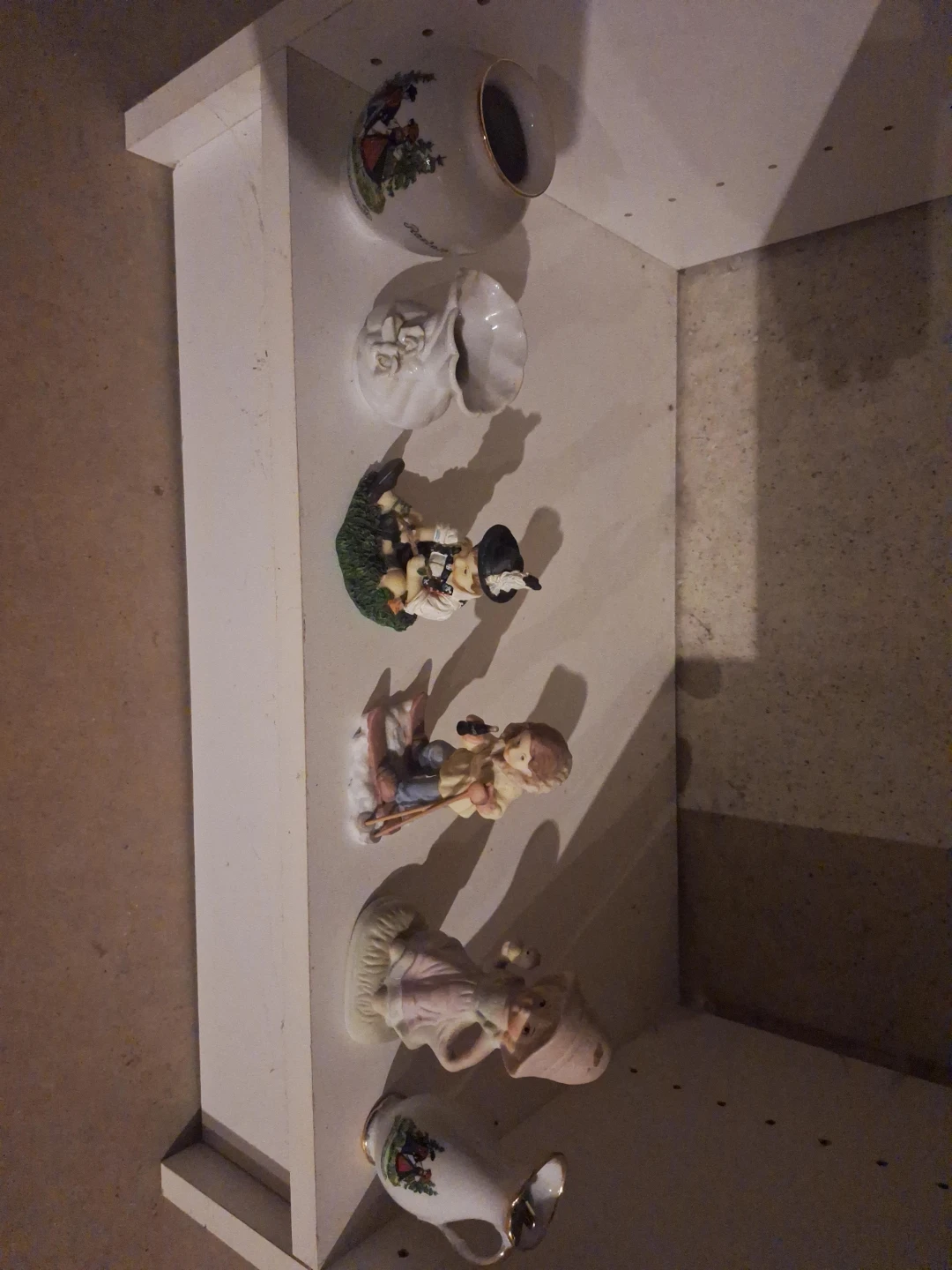 Collection of Decorative Ceramic Figurines and Vases