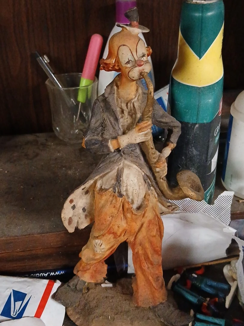 Clown Figurine Playing Saxophone