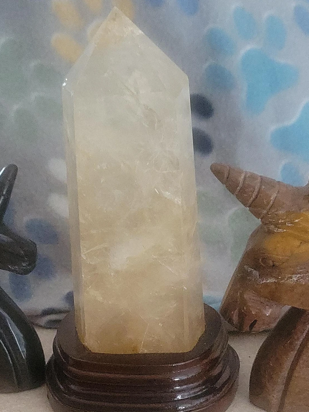 Polished Quartz Crystal Point with Wooden Stand