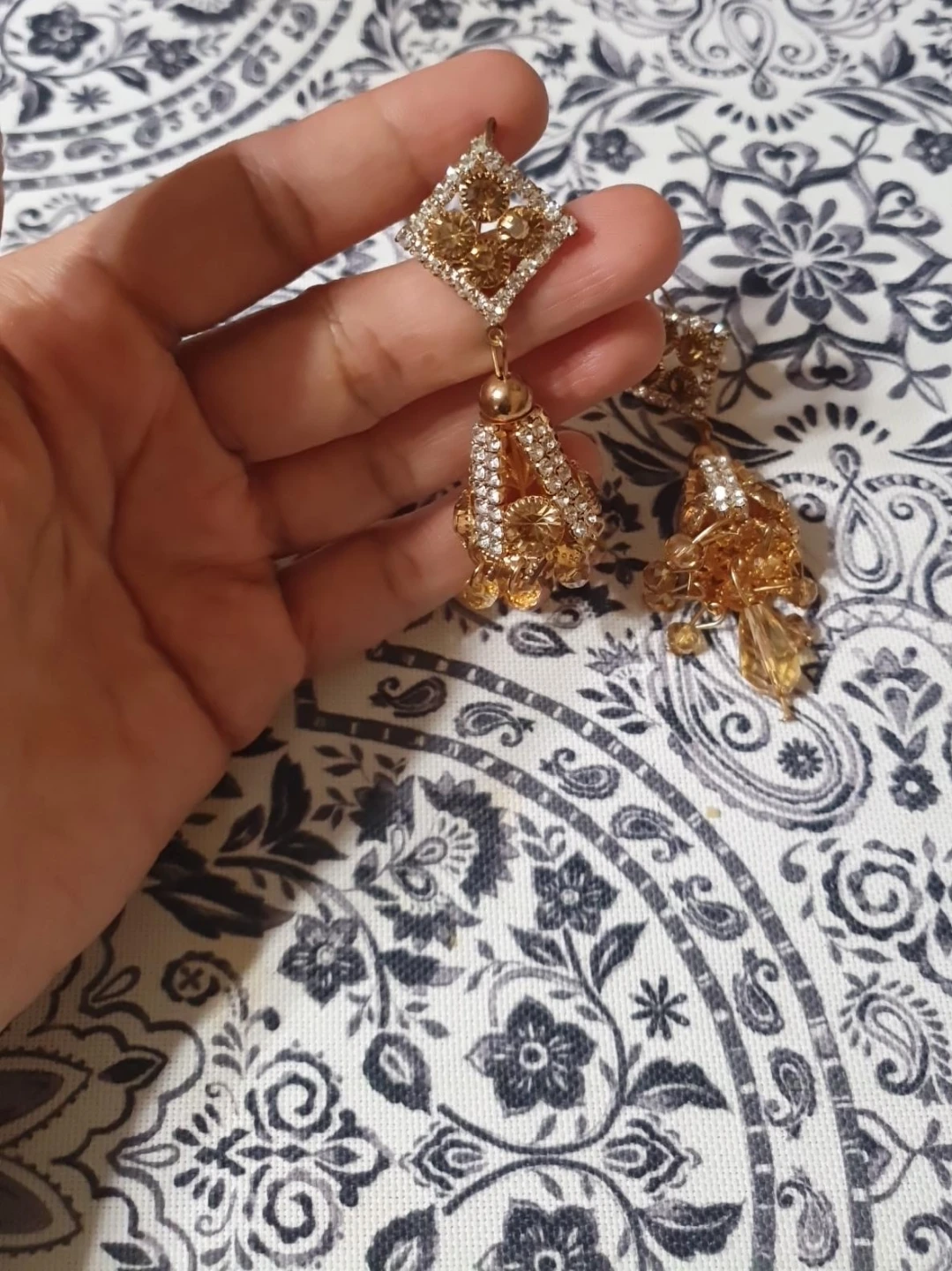Gold Jhumka Earrings with Crystals
