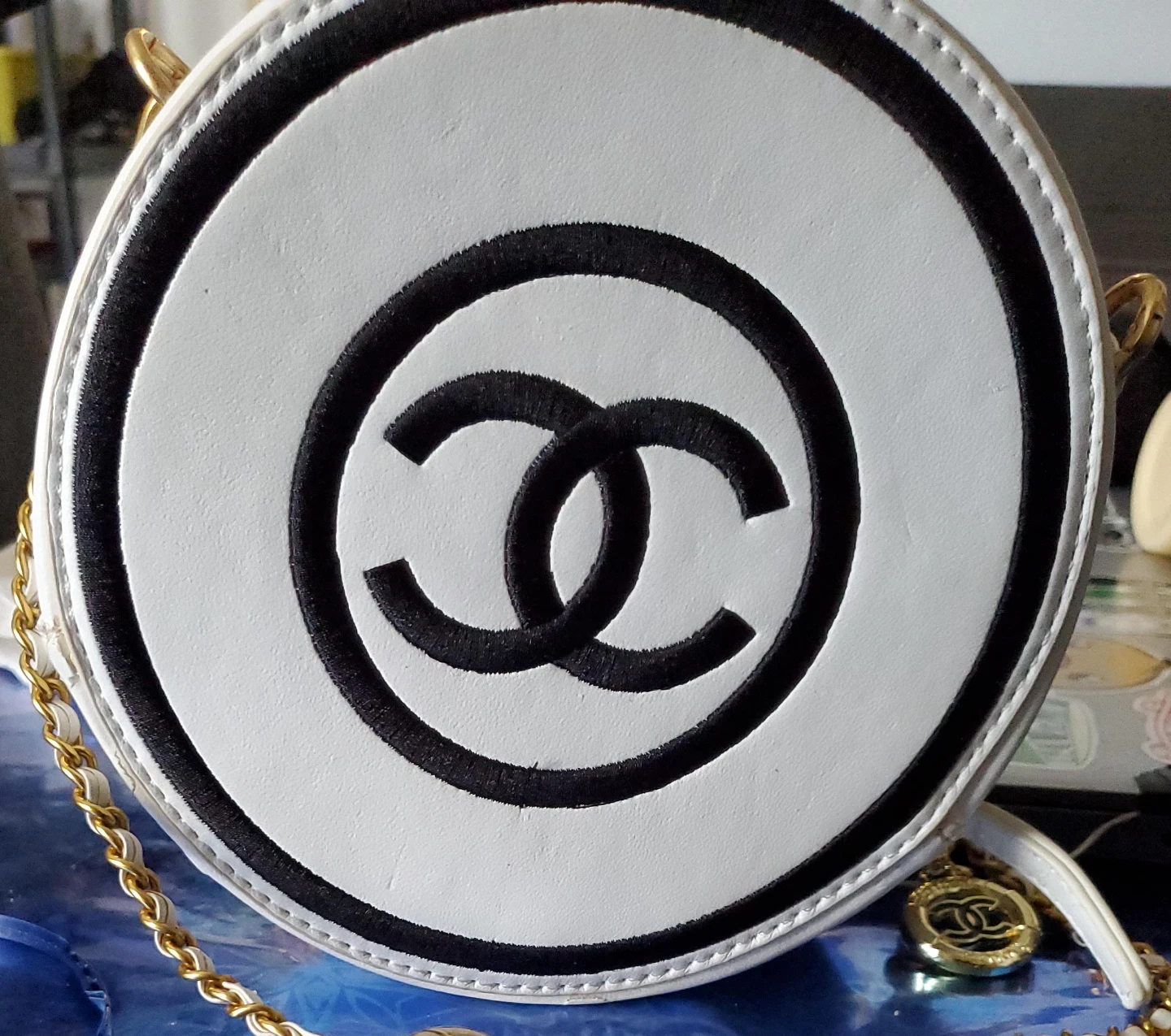 White Round Bag with Black Trim and Gold Chain