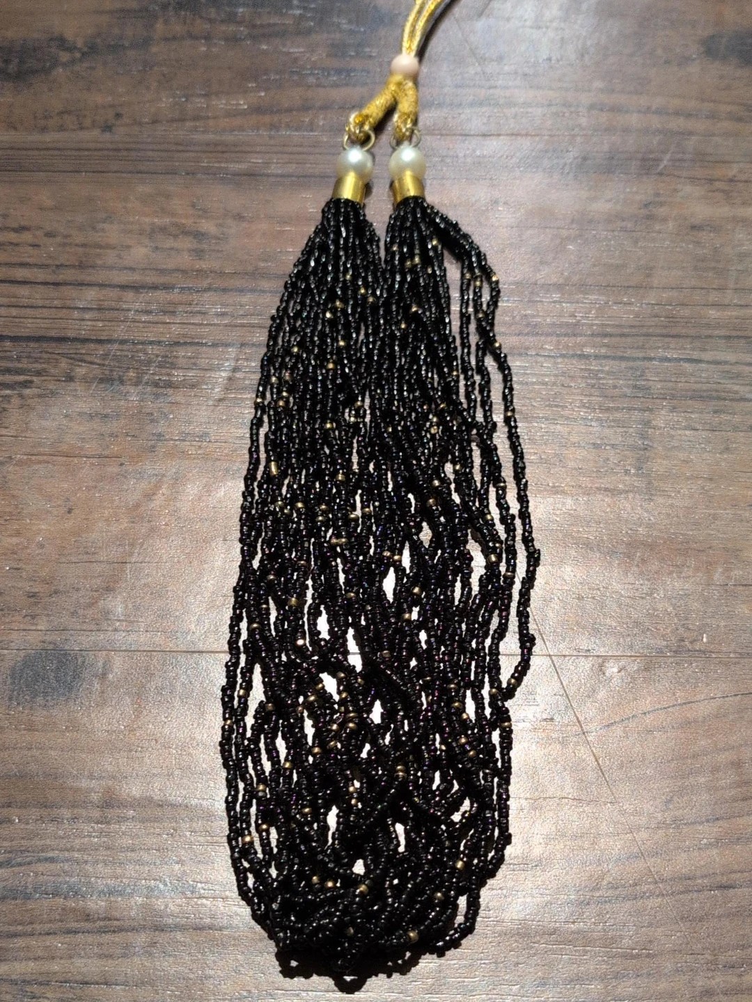 Black Beaded Necklace with Gold Accents