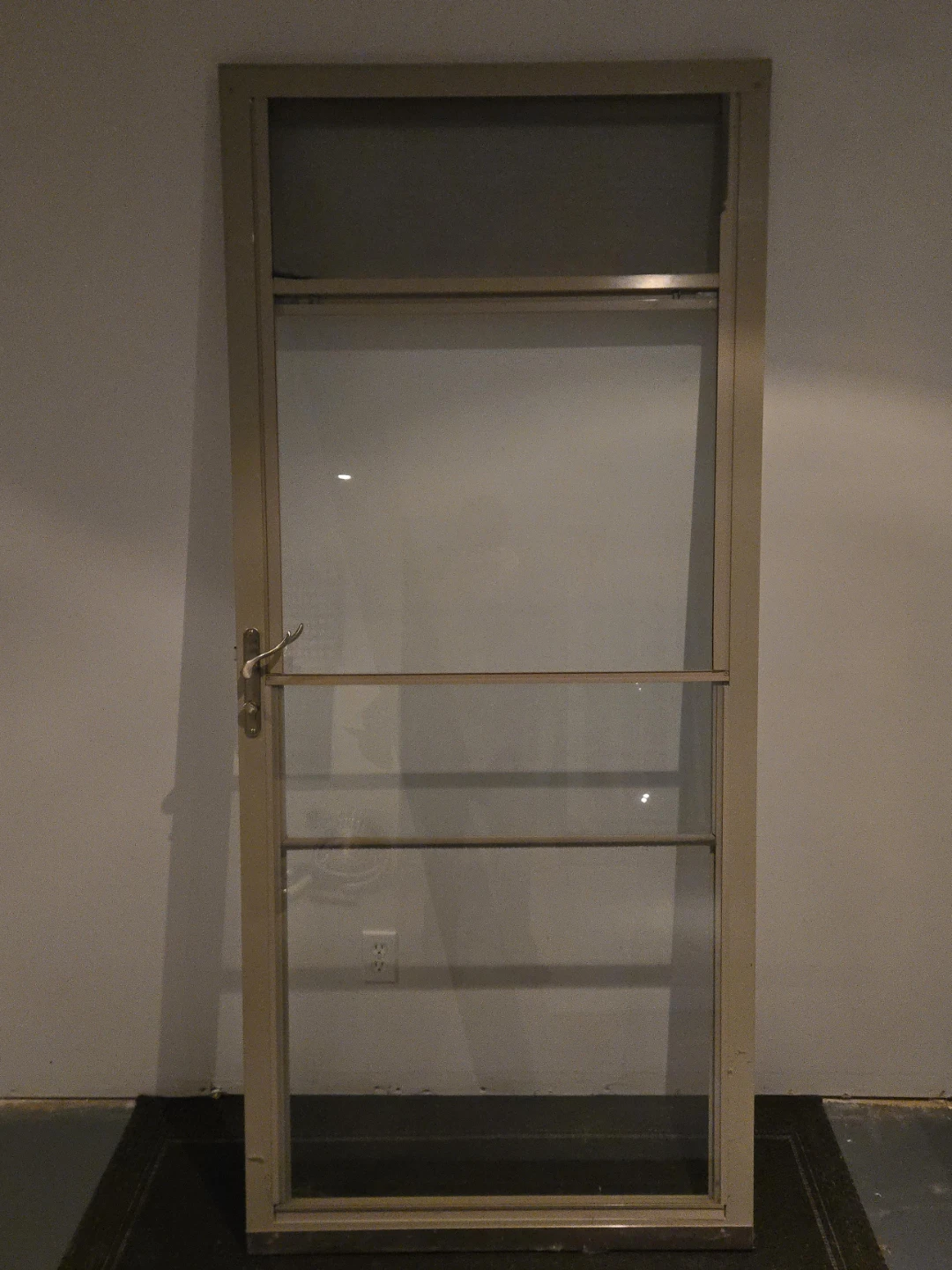 Storm Door with sliding half screen