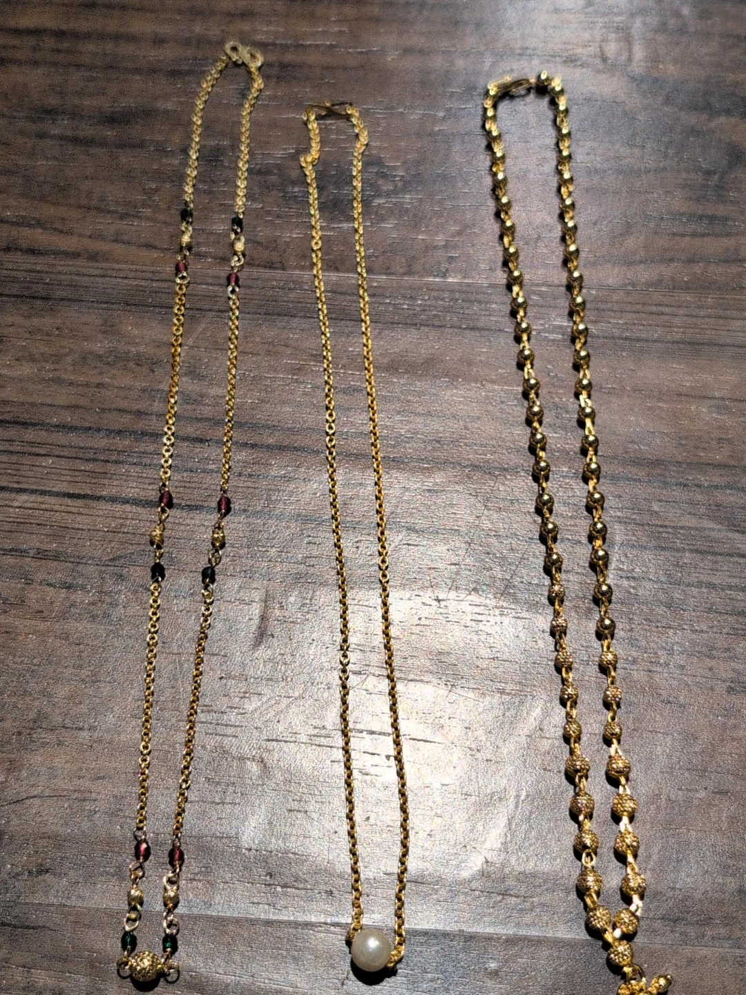 Three Gold-Tone Necklaces