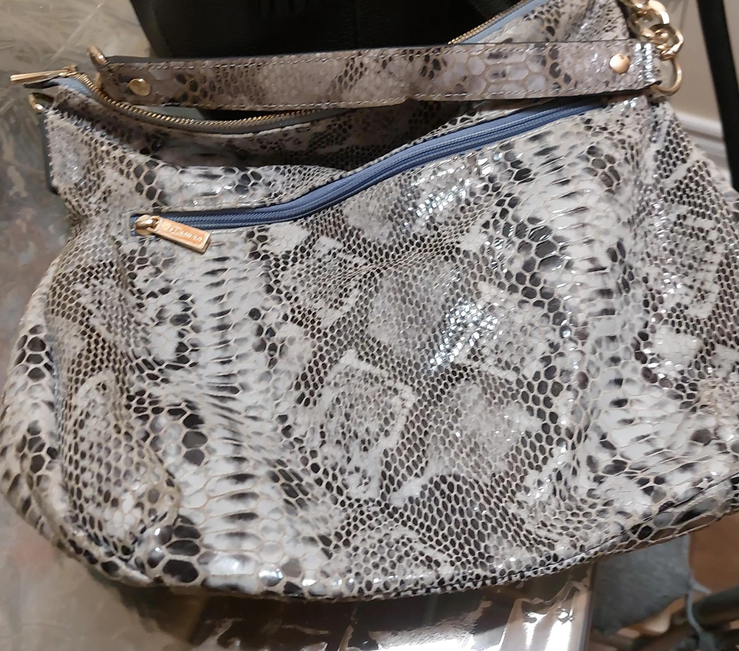 Danier,leather snake print pusse