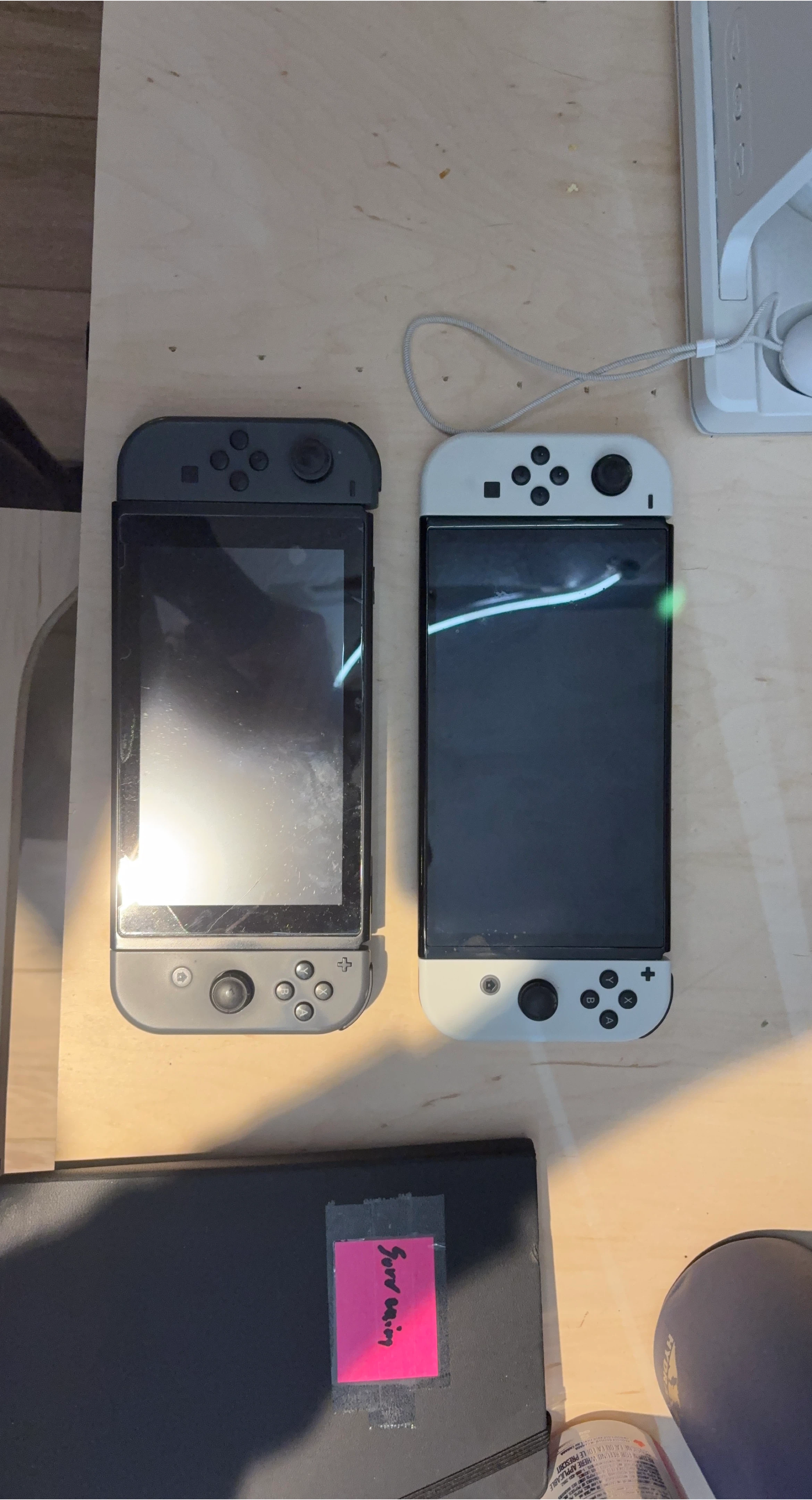 Nintendo switch OLED, and original nintendo switch