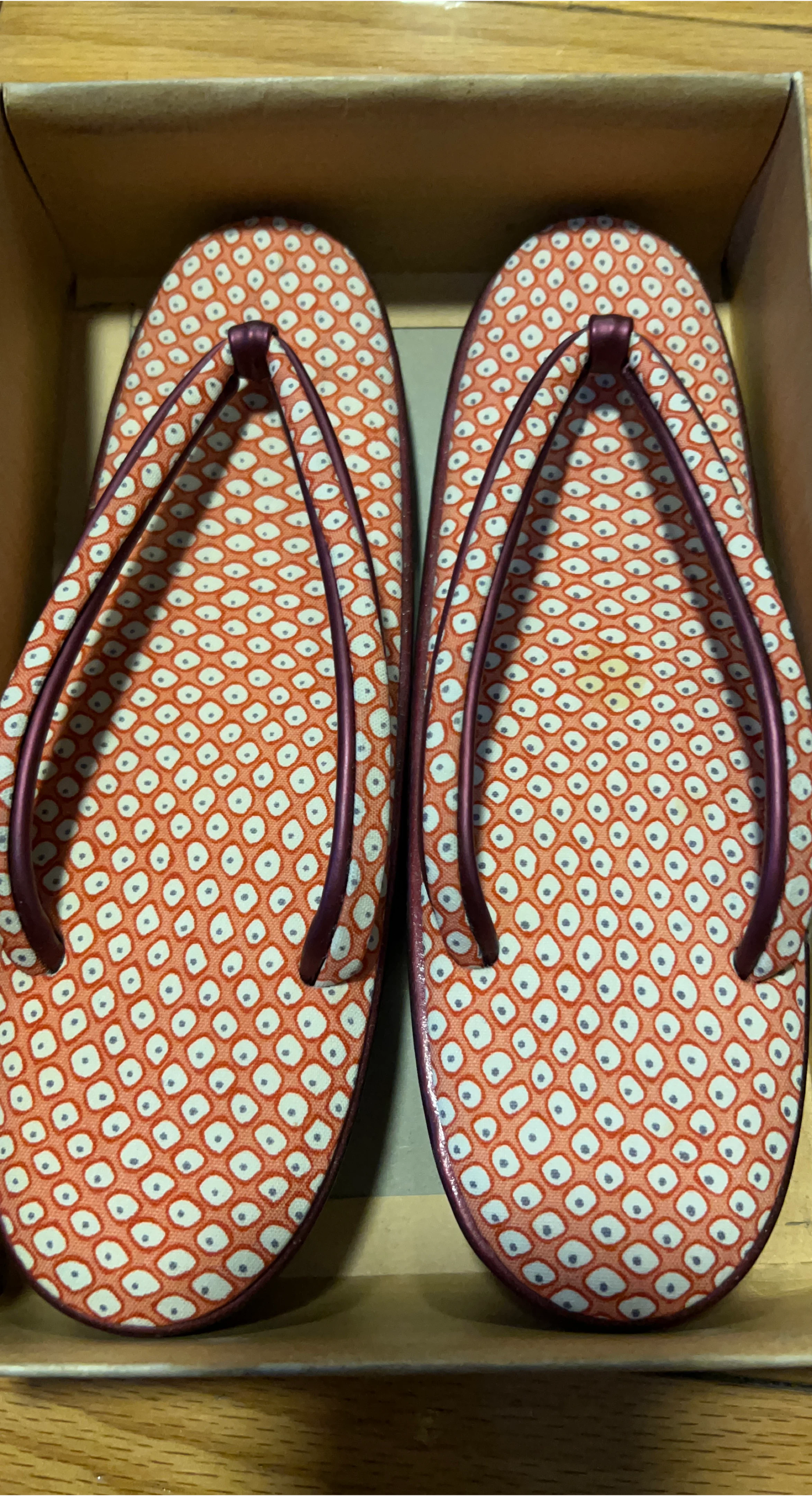 Orange Patterned Flip Flops