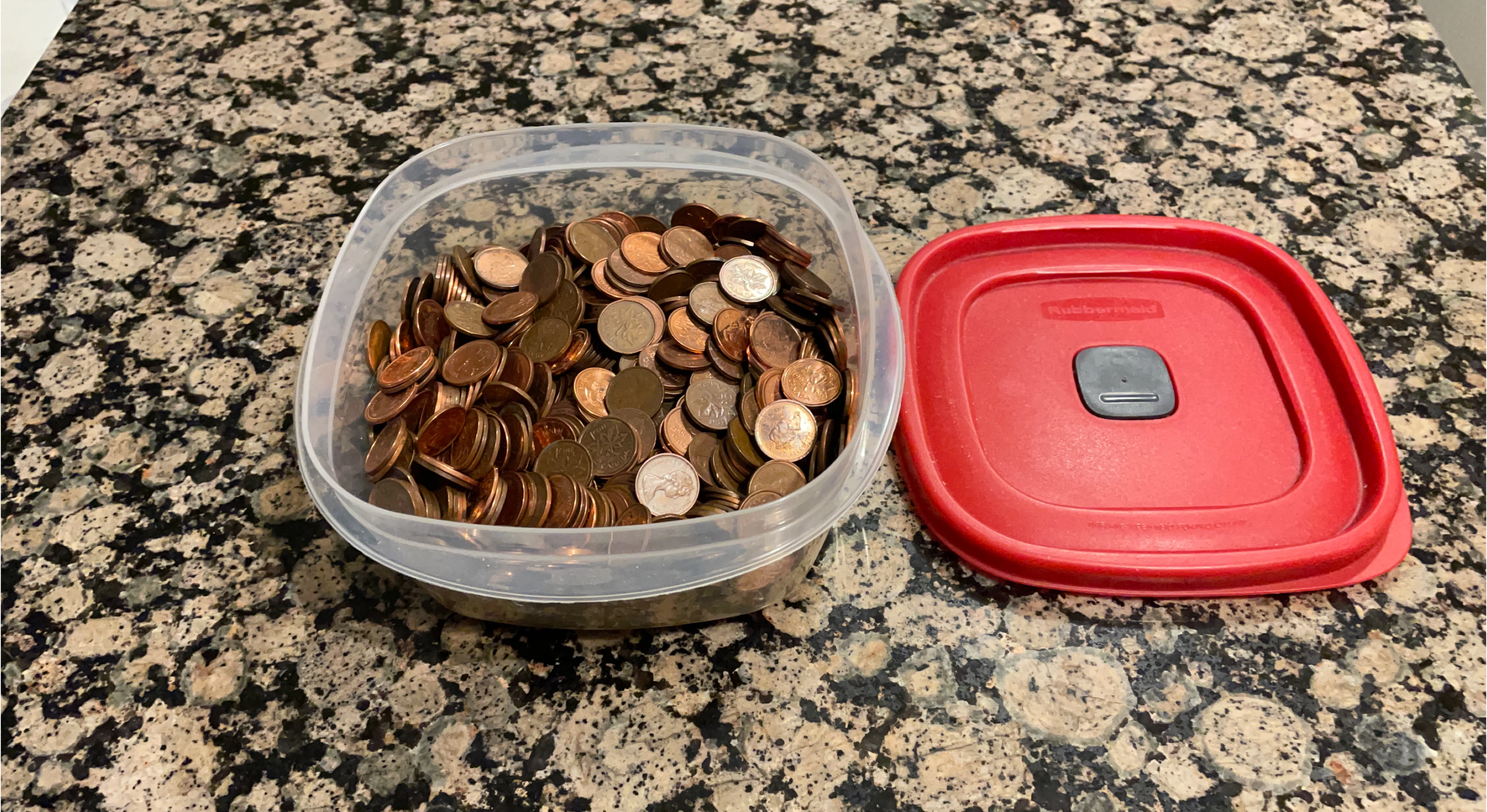 Canadian Pennies in Rubbermaid Container