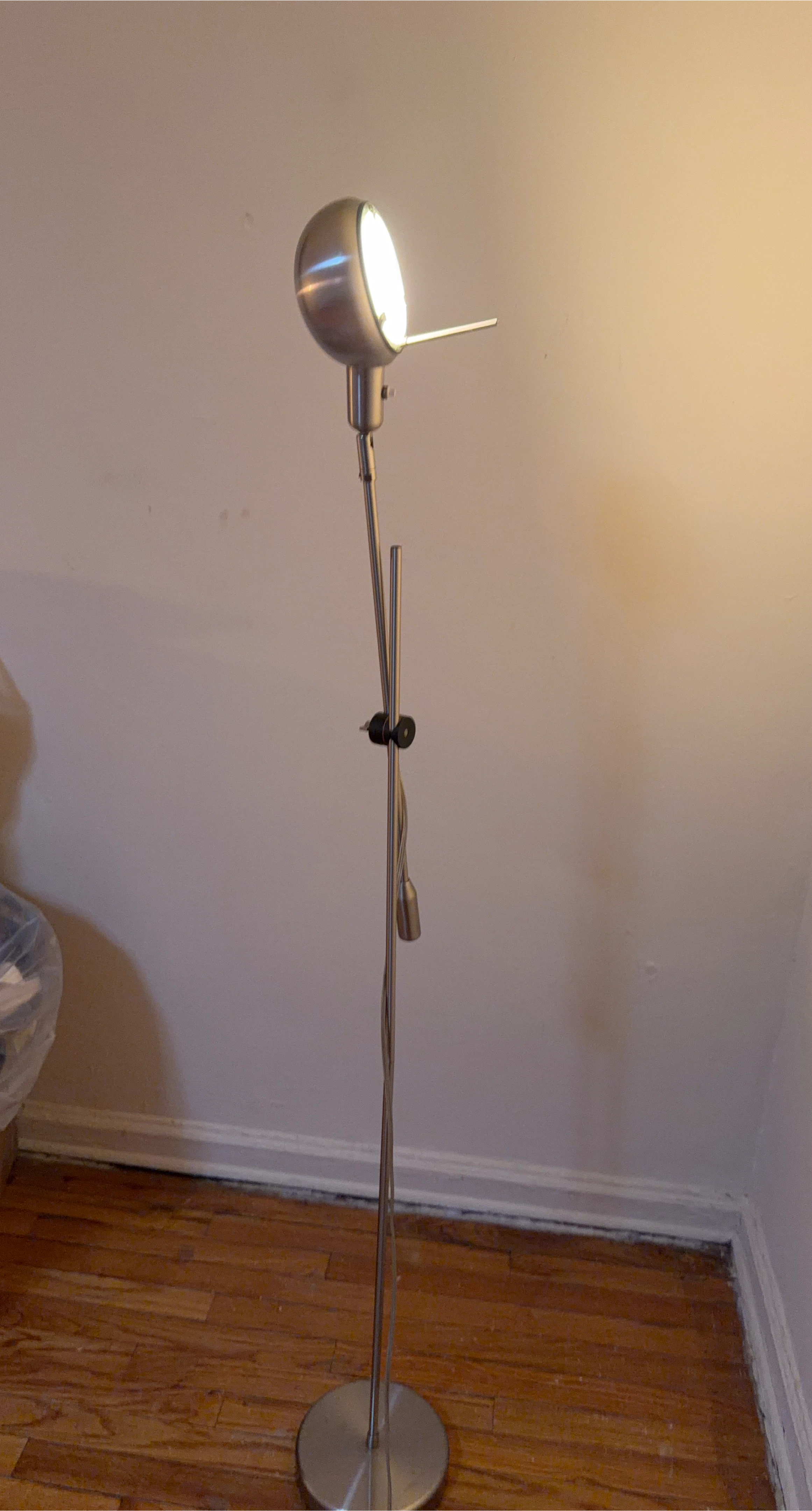 Sleek Metal Floor Lamp with Adjustable Head