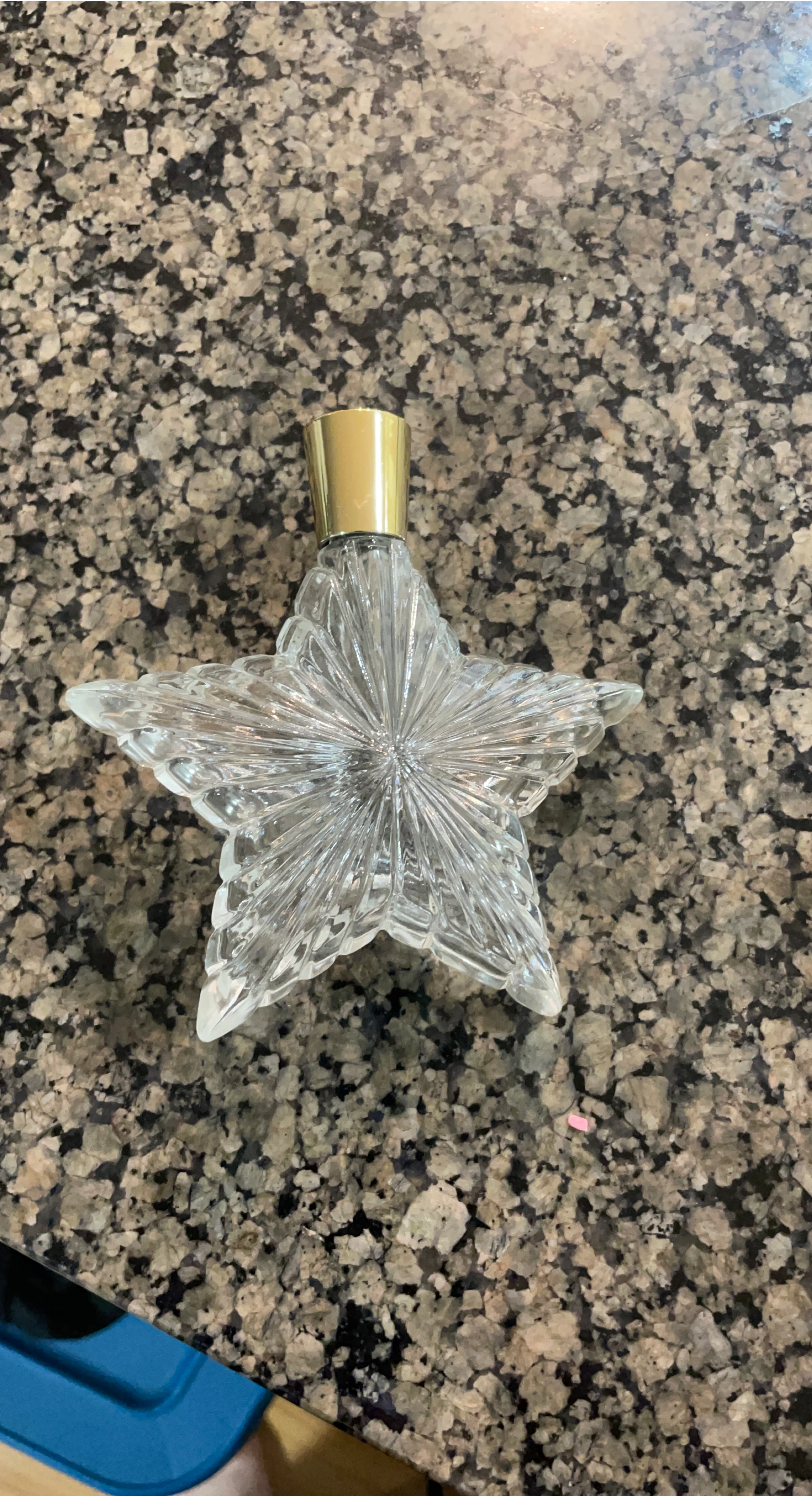 Clear Star-Shaped Glass Bottle with Gold Cap