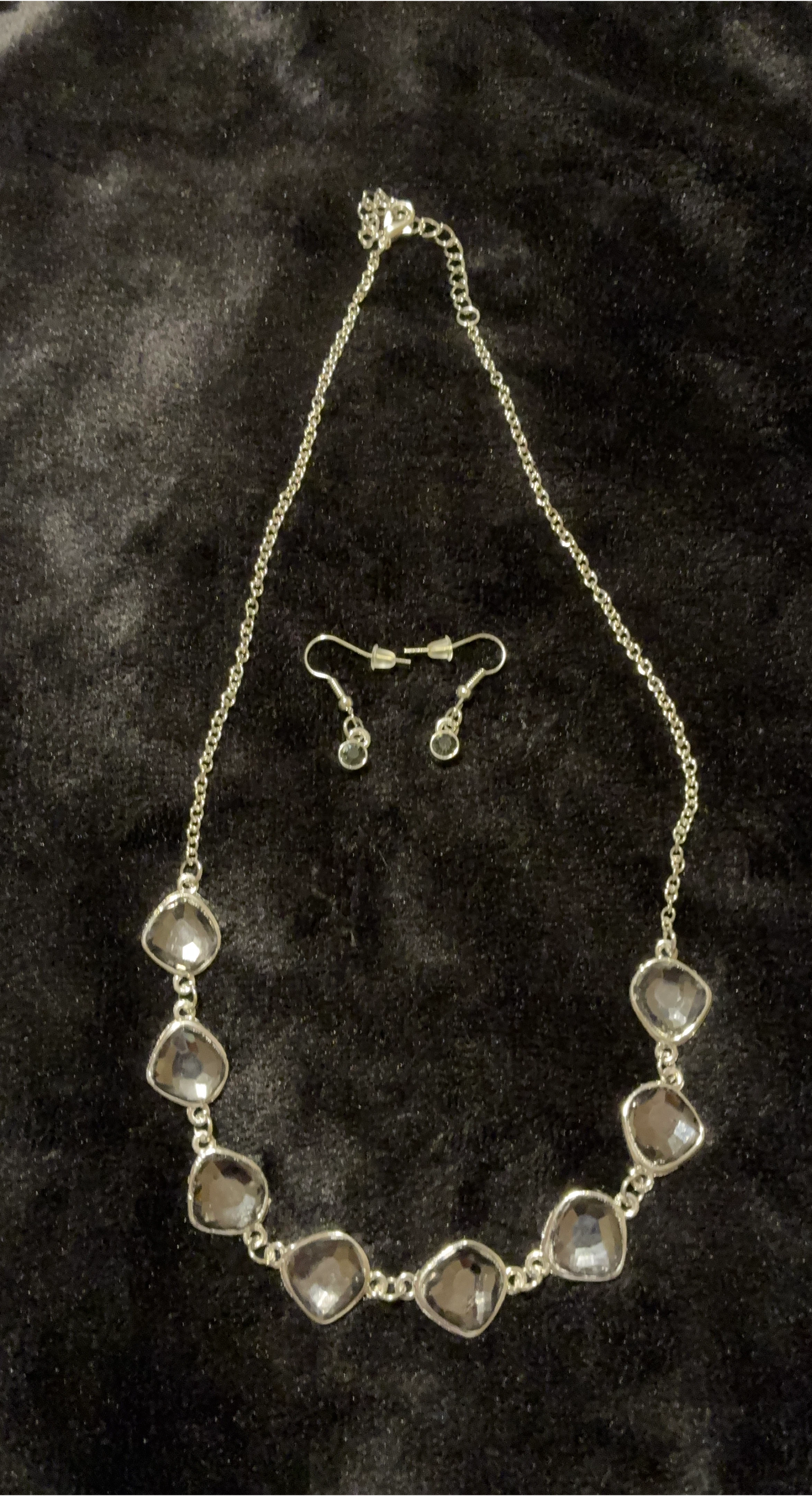 Silver tone necklace set with grey stones