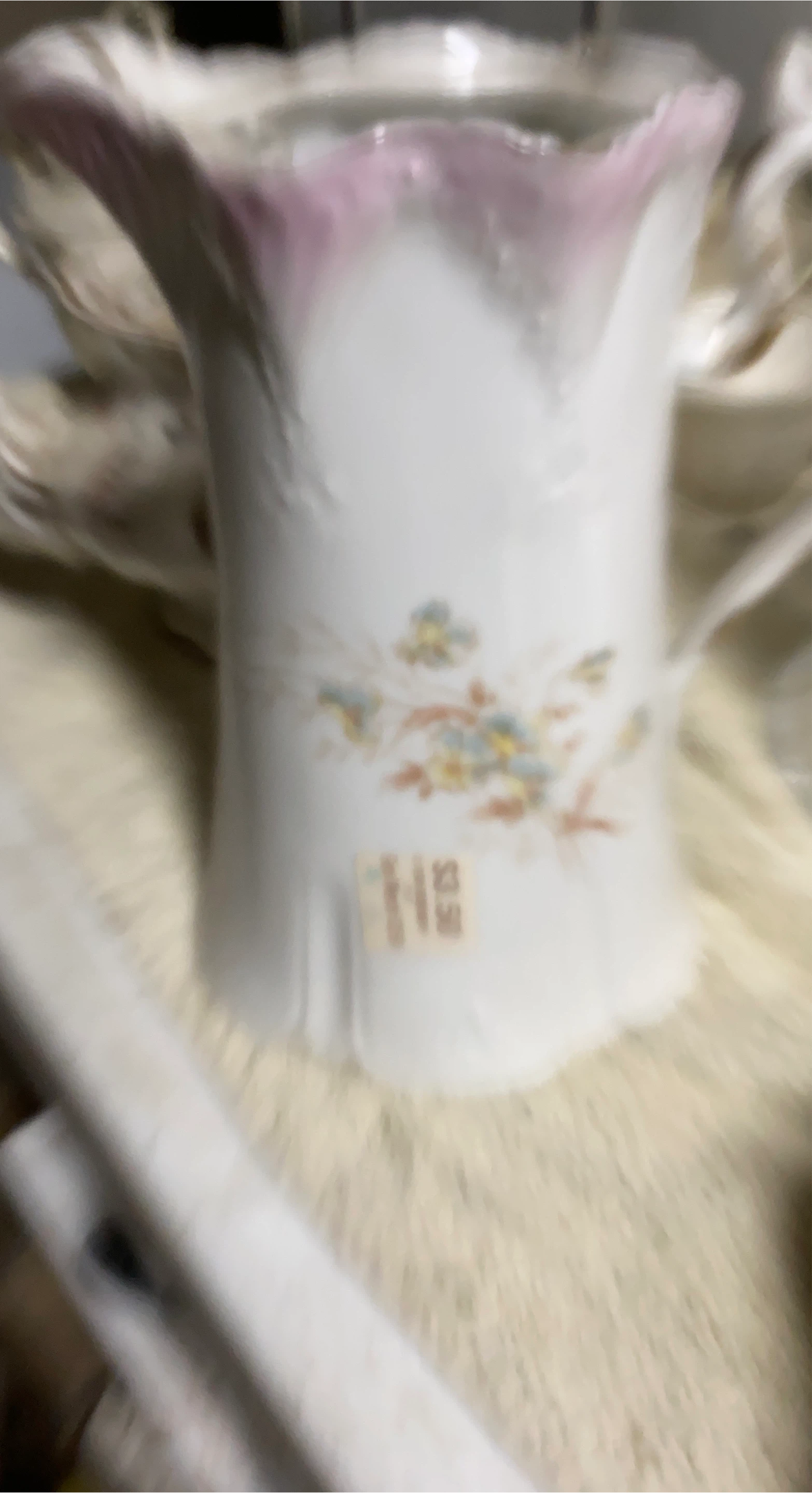 Vintage White Ceramic Pitcher with Pink Trim and Floral Design