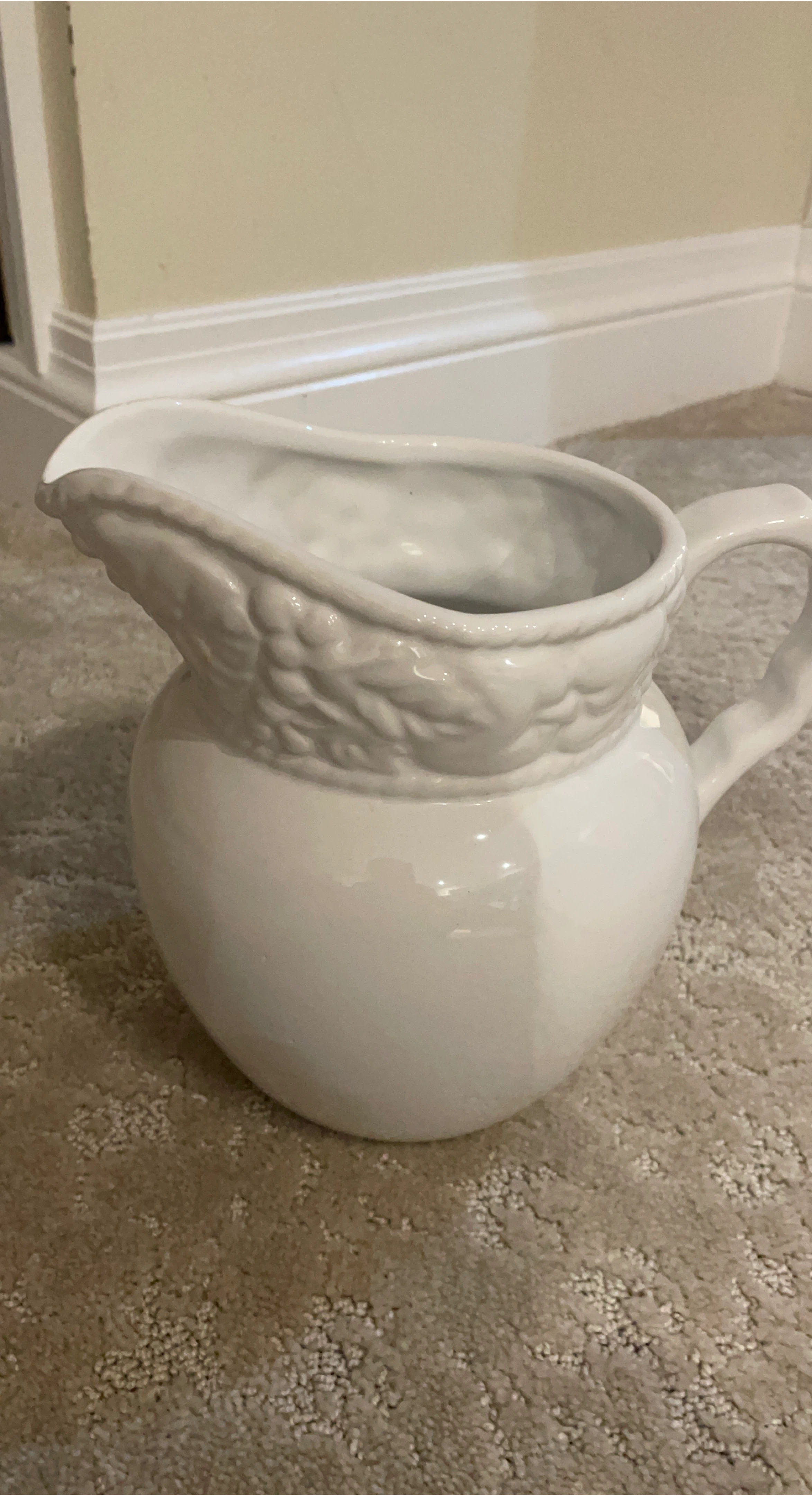 White Ceramic Pitcher with Embossed Design