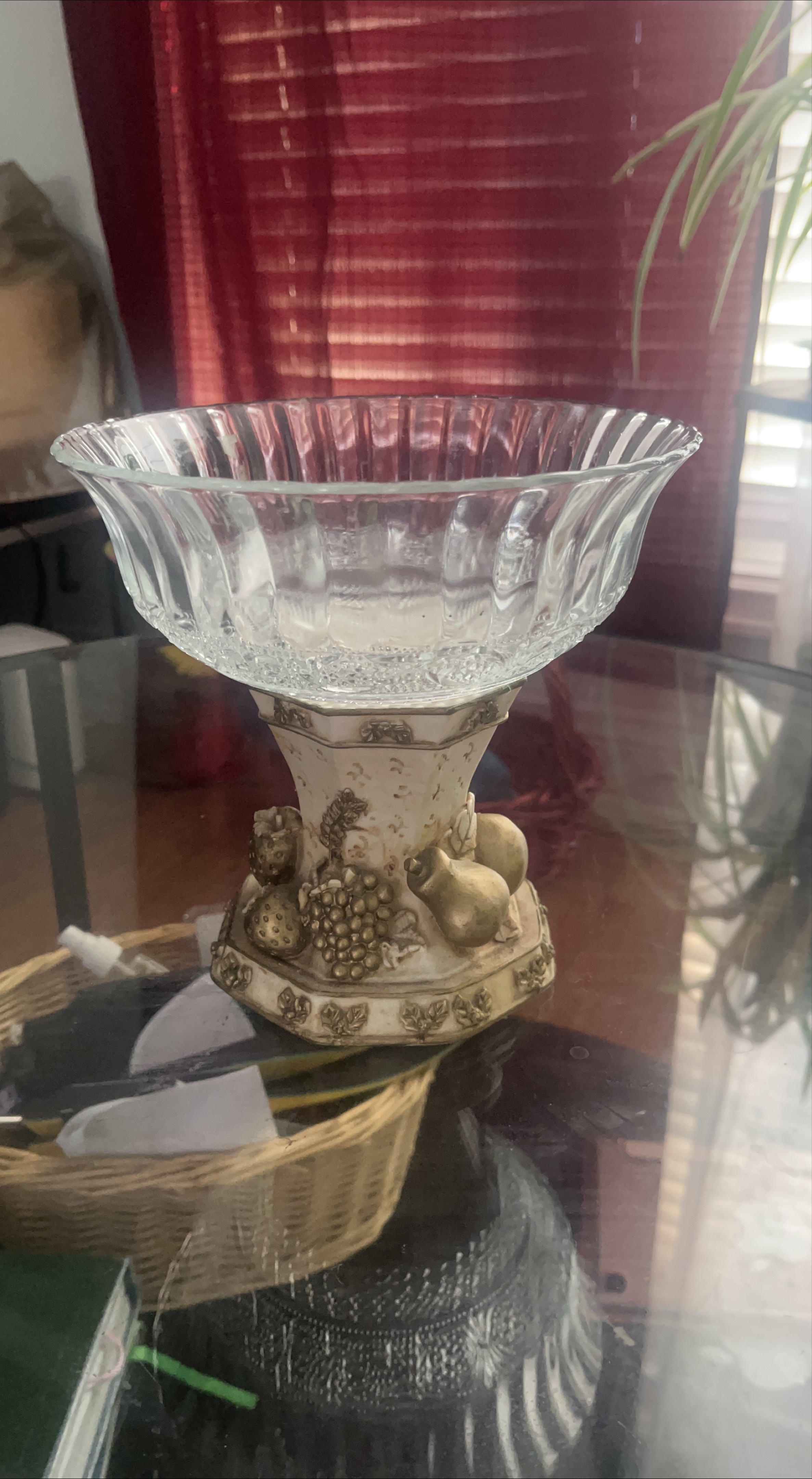 Glass fruit bowl with decorative base