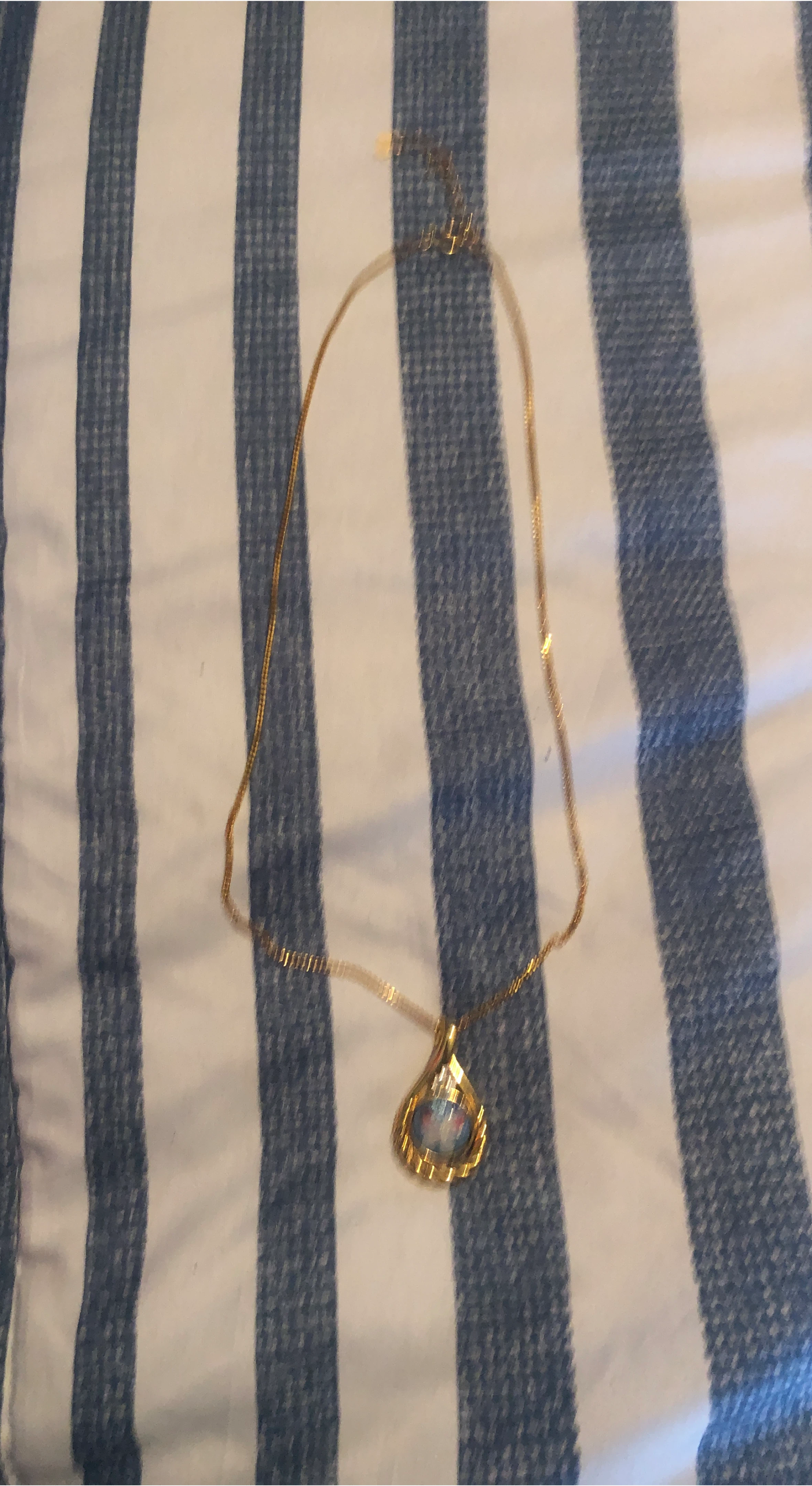 Gold Tone Pendant Necklace with Floral Design