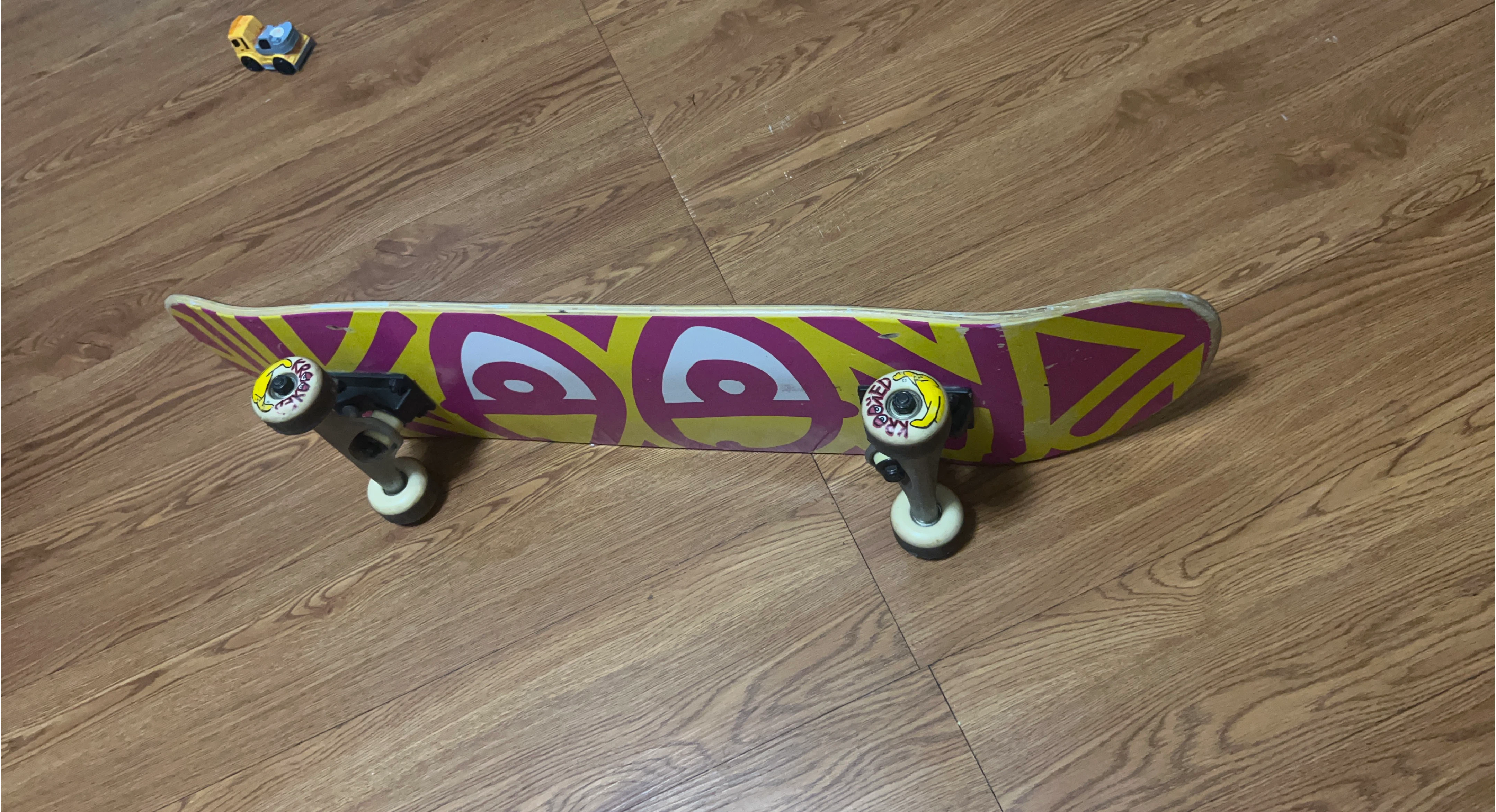 Skateboard with Eye Graphic